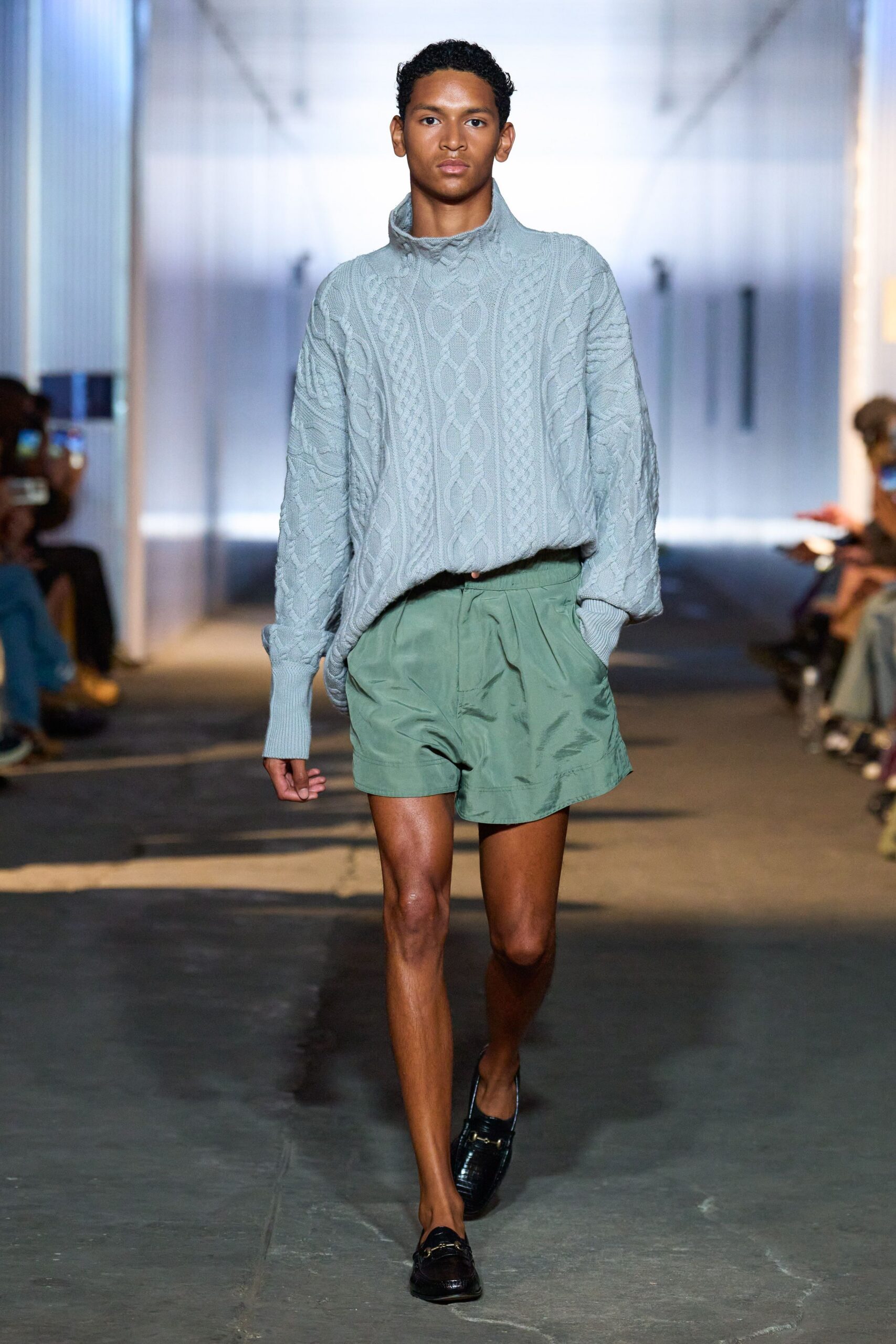 gray relaxed sweater with green shorts