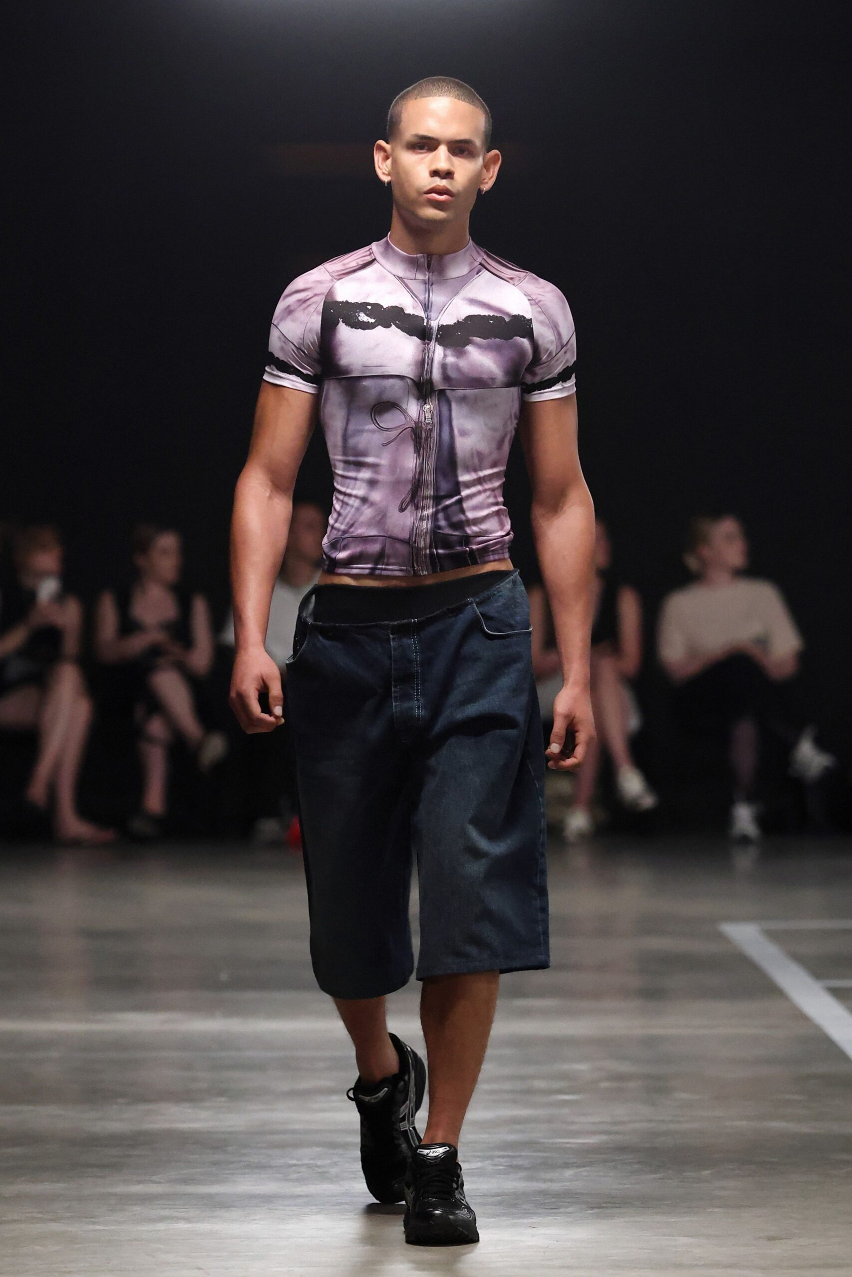 purple printed t-shirt with denim shorts