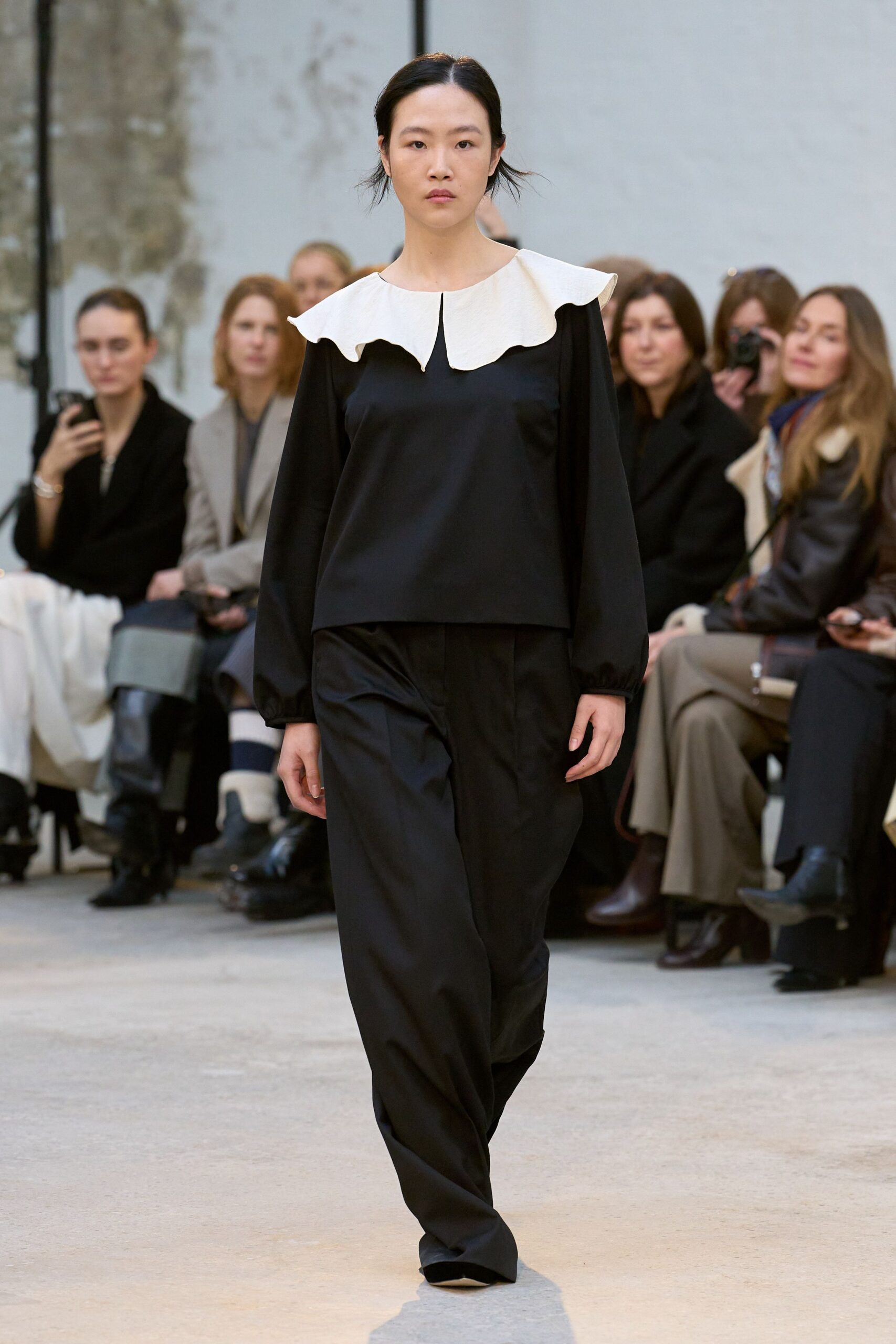 black and white fitted top with relaxed pants