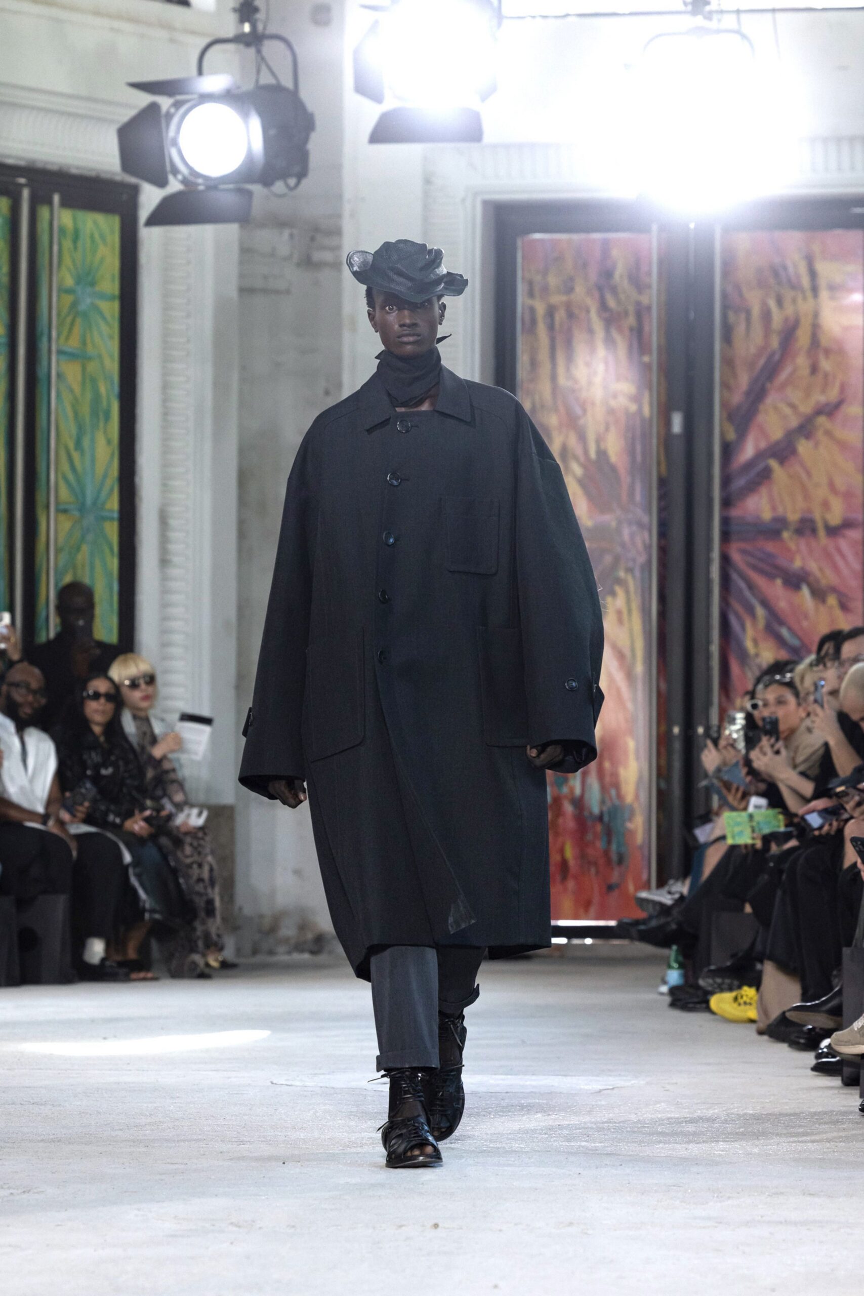 black wool long-sleeve collared oversized buttoned coat