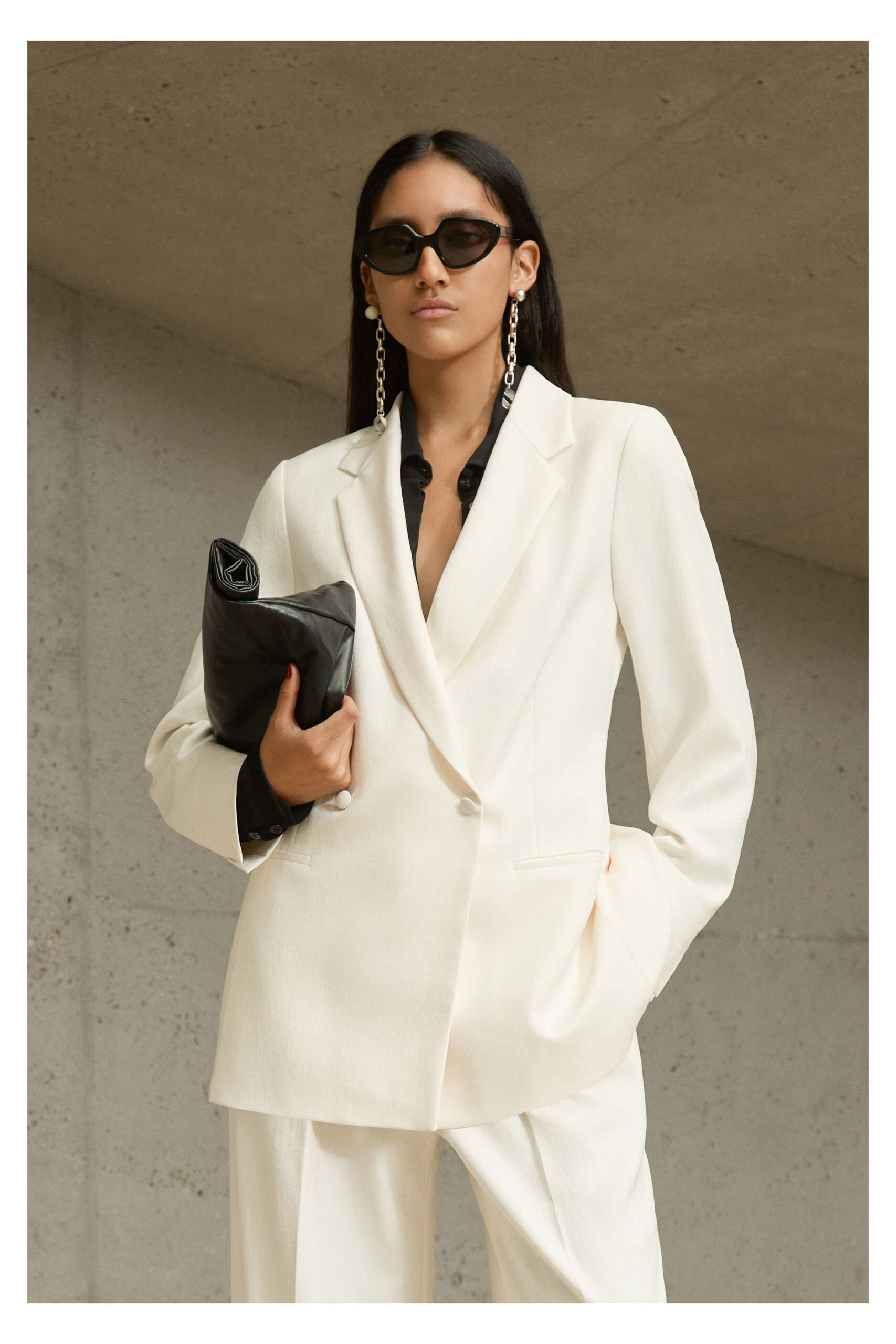 white tailored blazer with black shirt