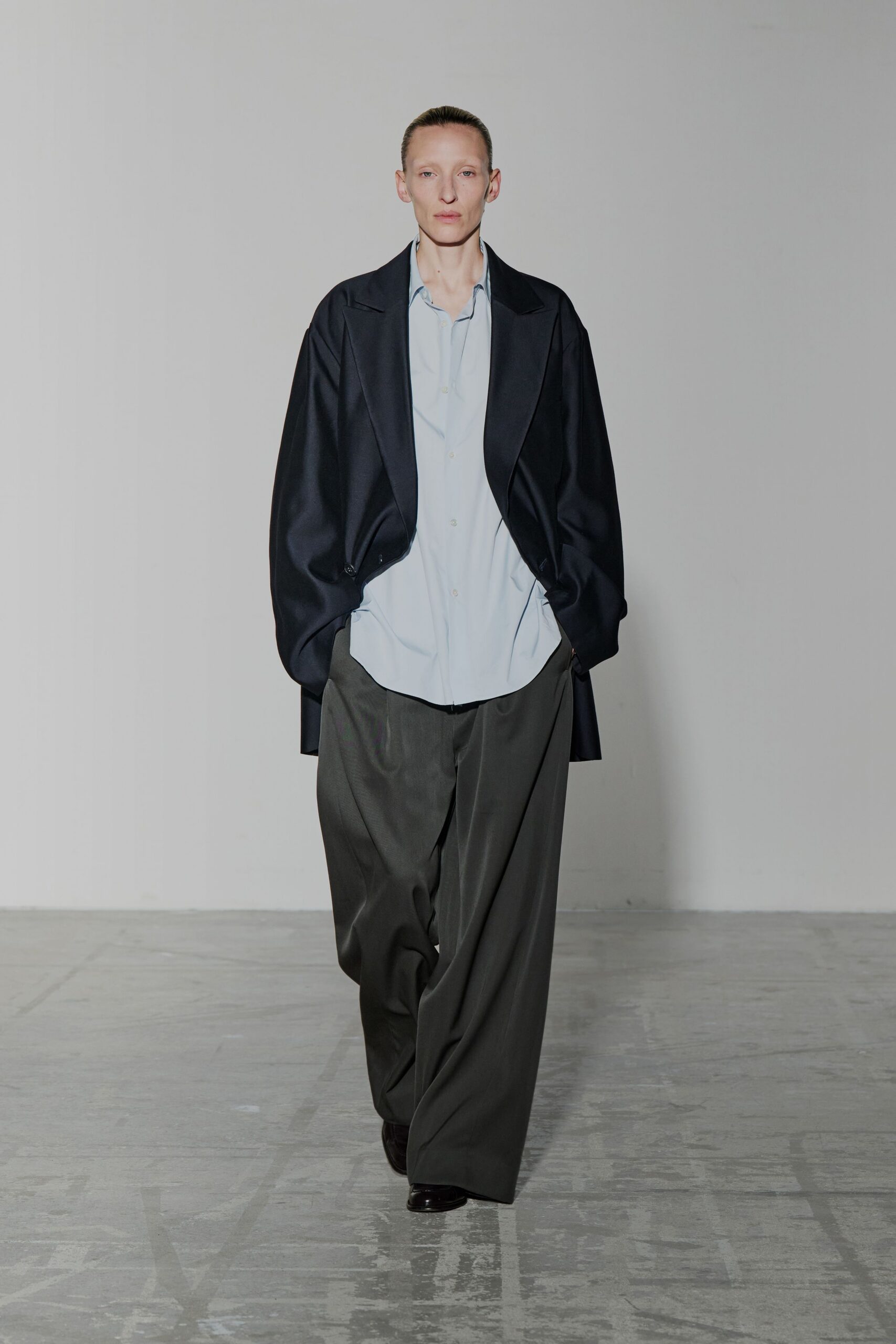 oversized black jacket with relaxed shirt and pants