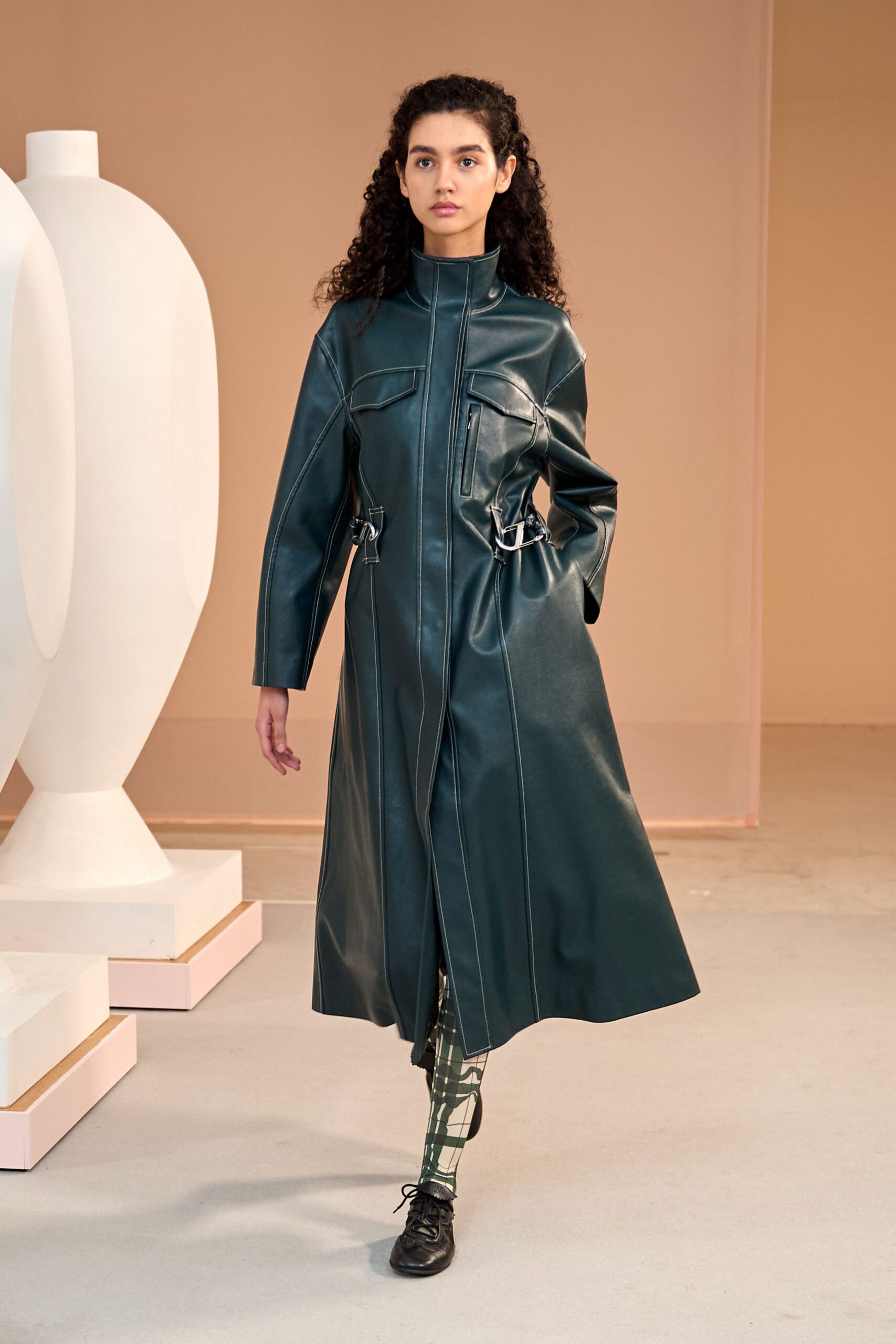 green leather long-sleeve collared relaxed zippered pockets coat
