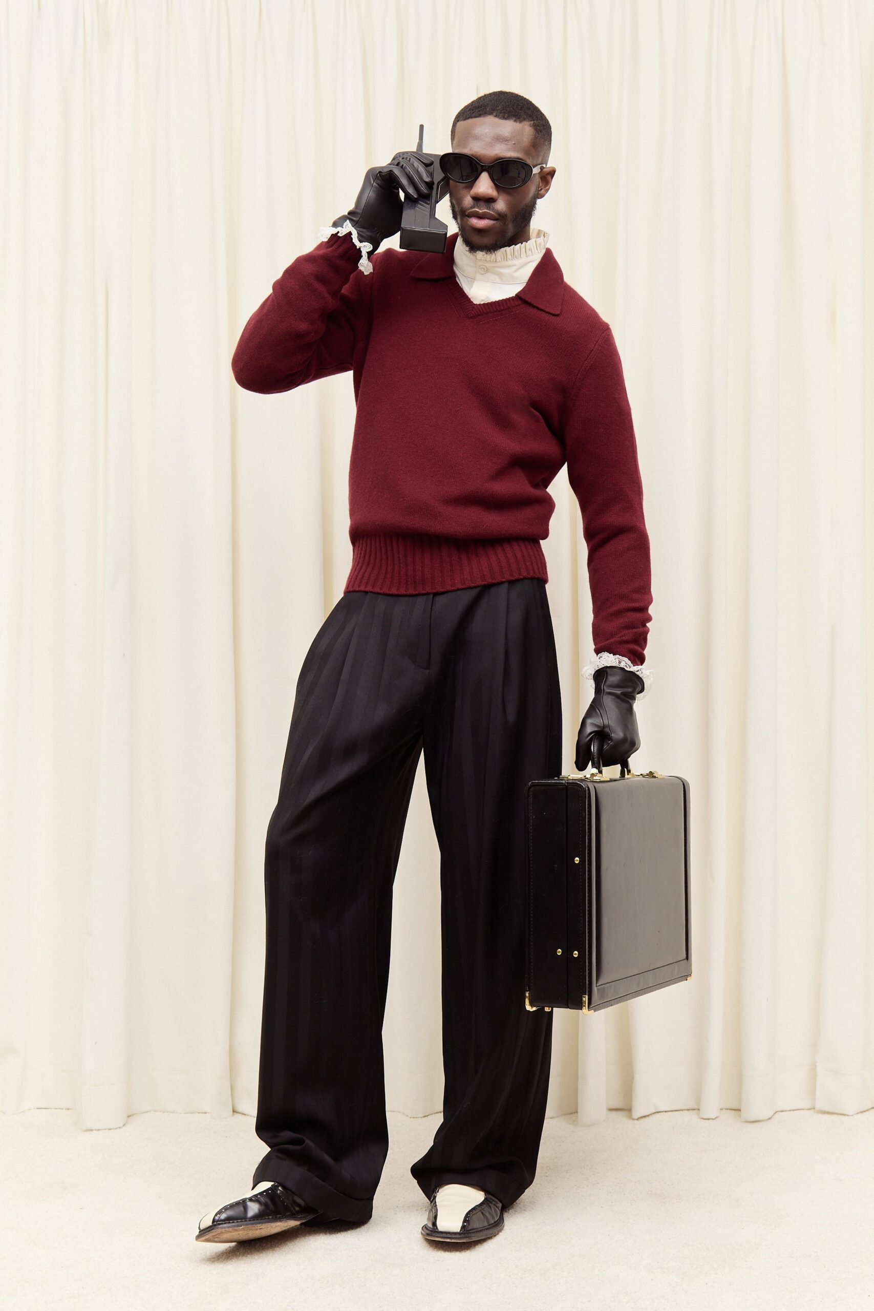 red wool fitted sweater with black pants