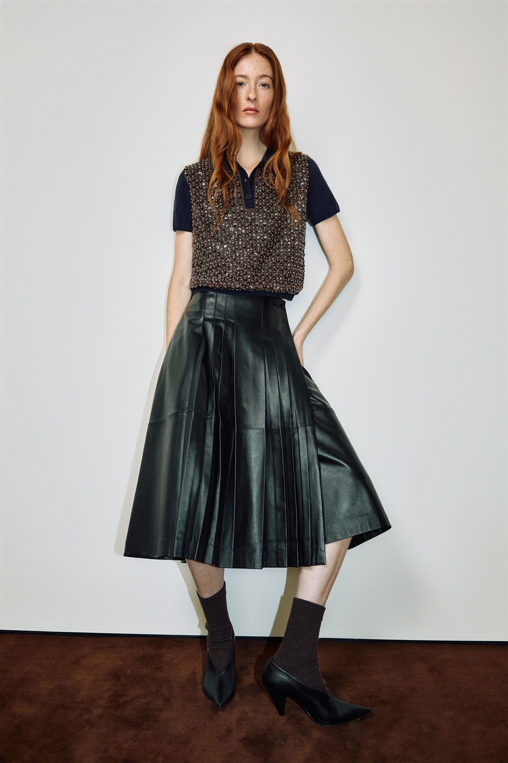 black cotton short-sleeve collared relaxed pleated top