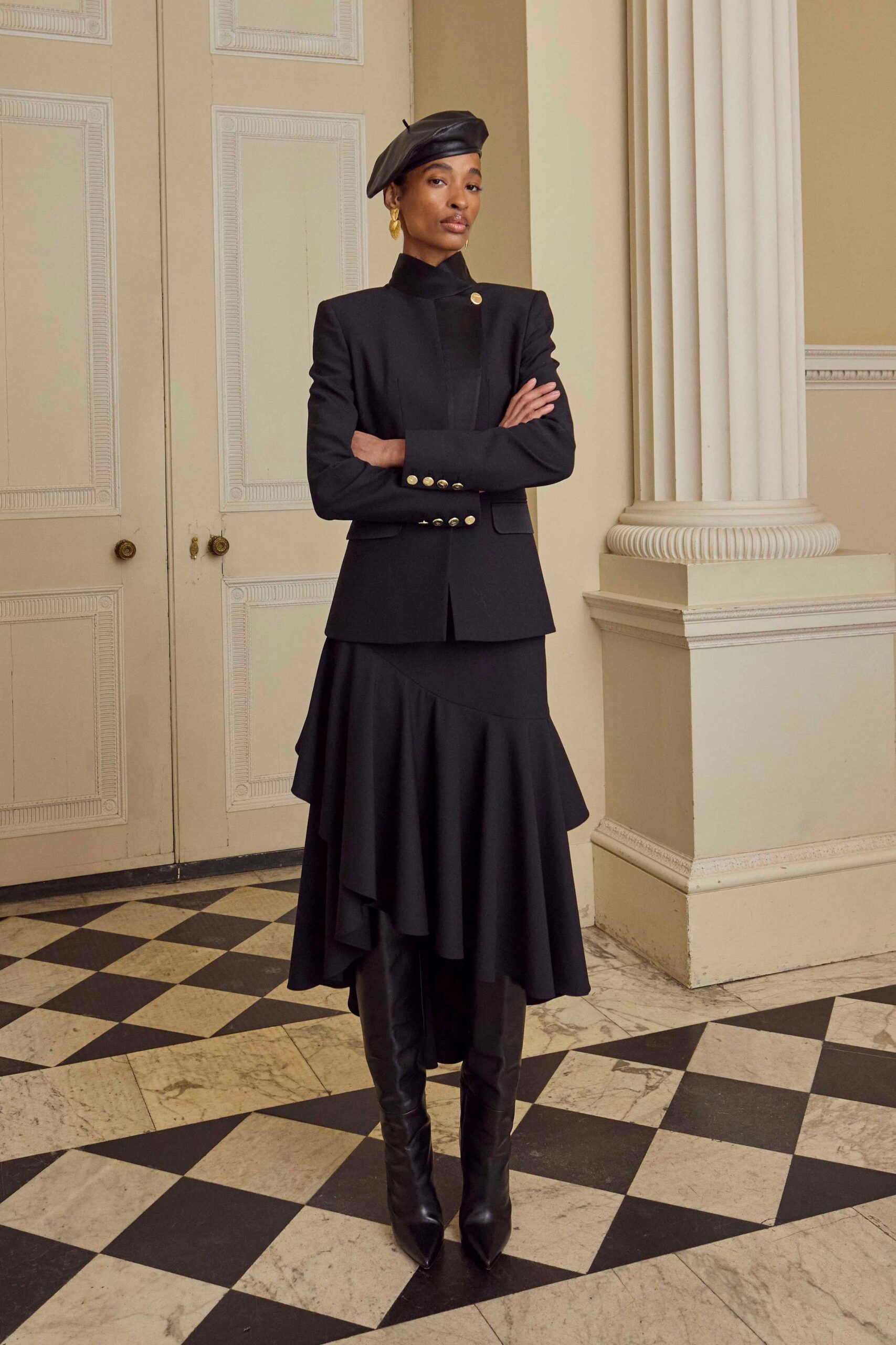 black tailored blazer and tiered skirt