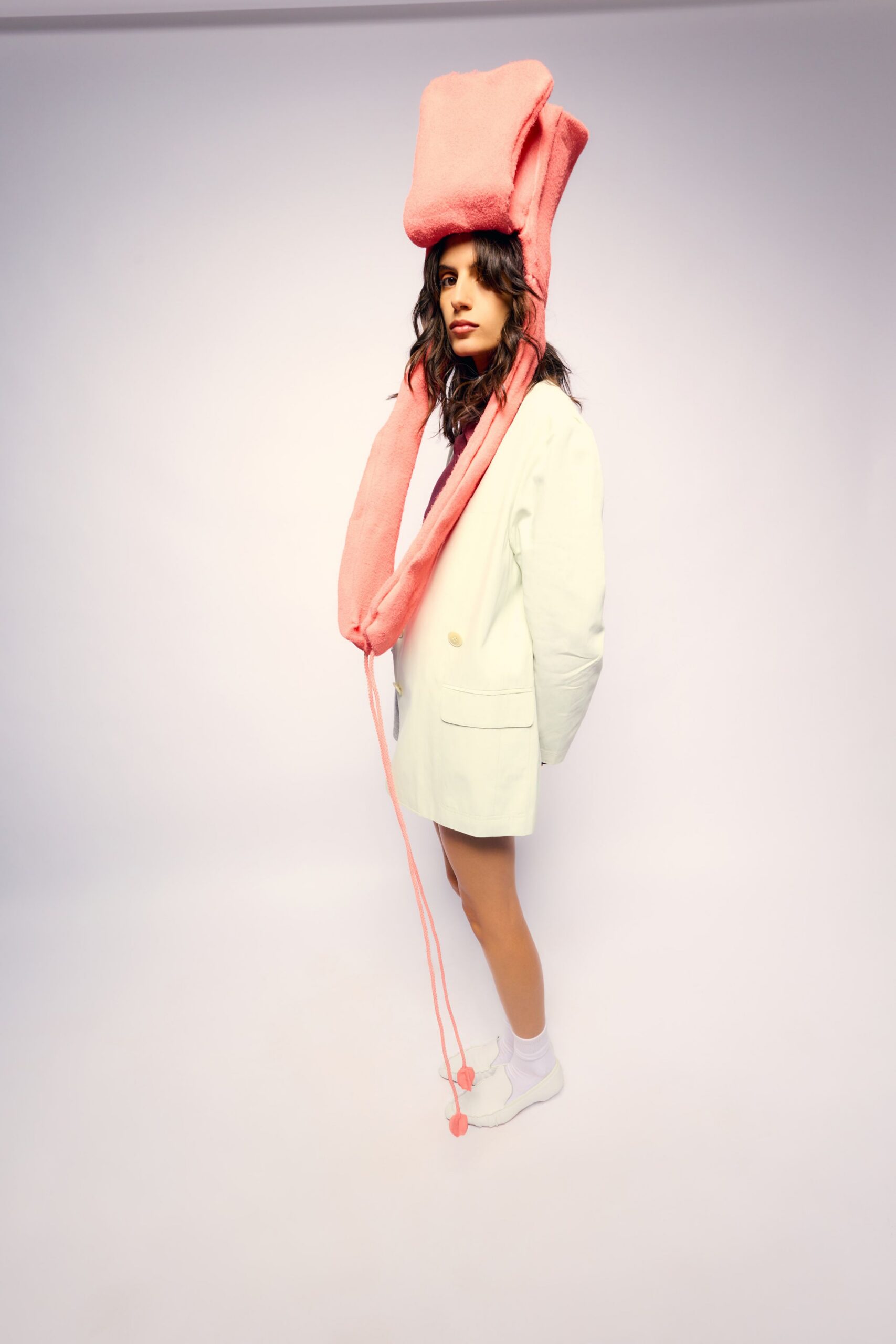 white blazer with pink accessories
