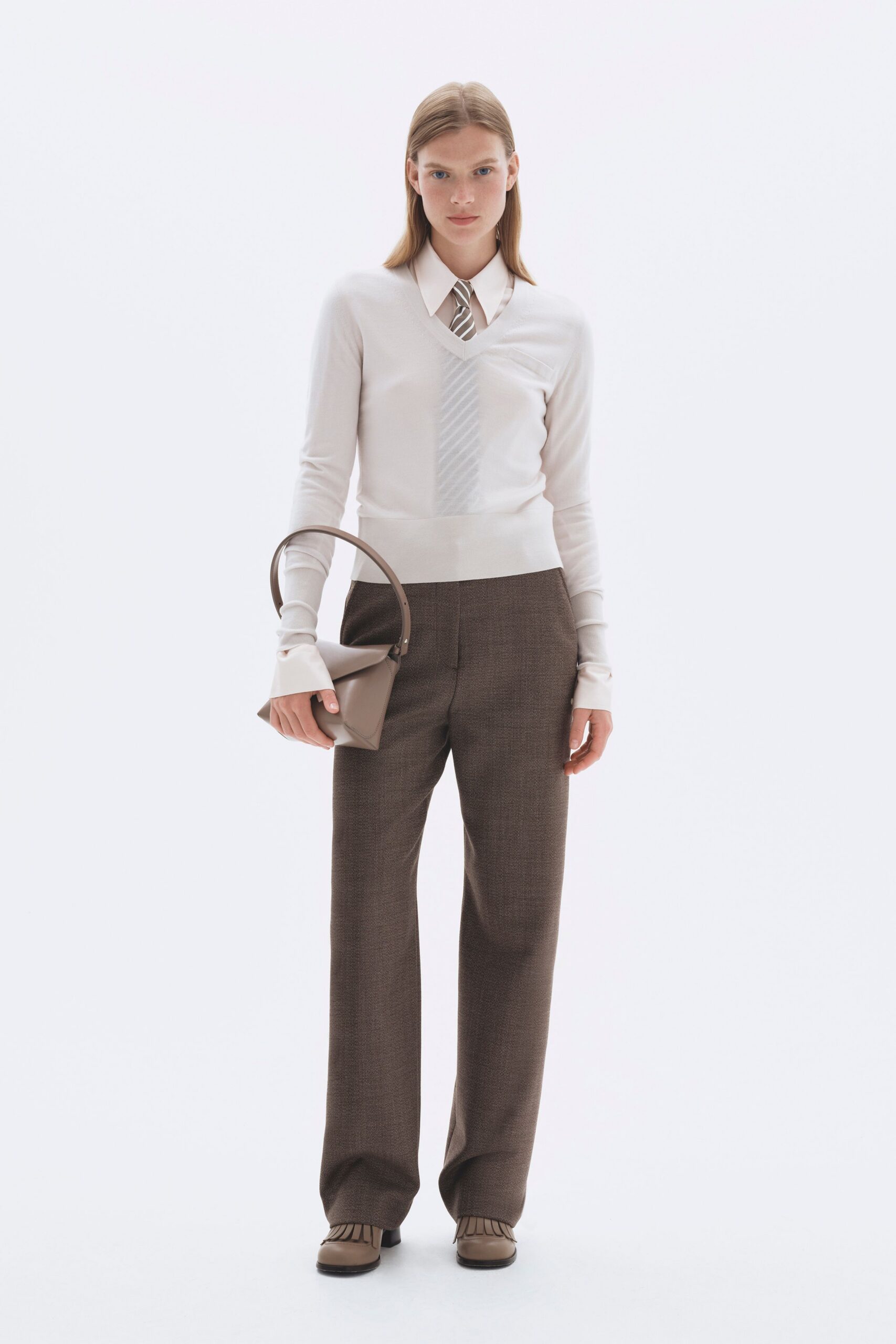 white fitted shirt brown pants