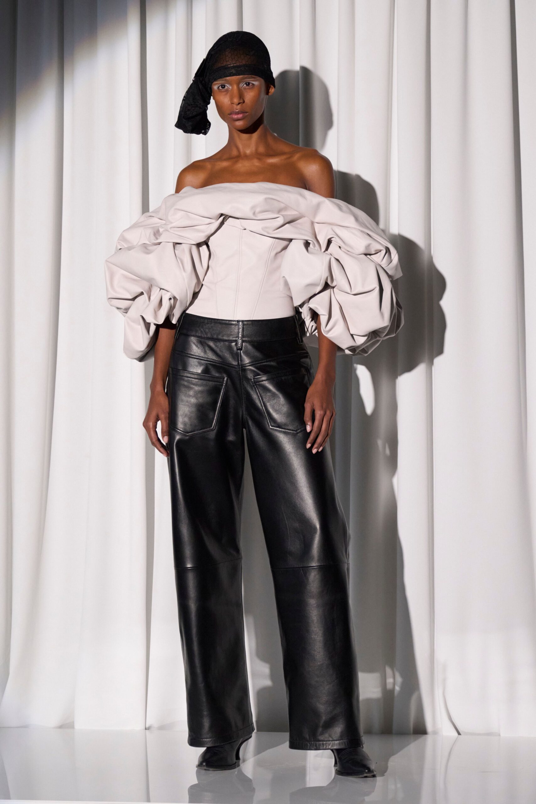 pink leather sleeveless off-shoulder fitted padded top