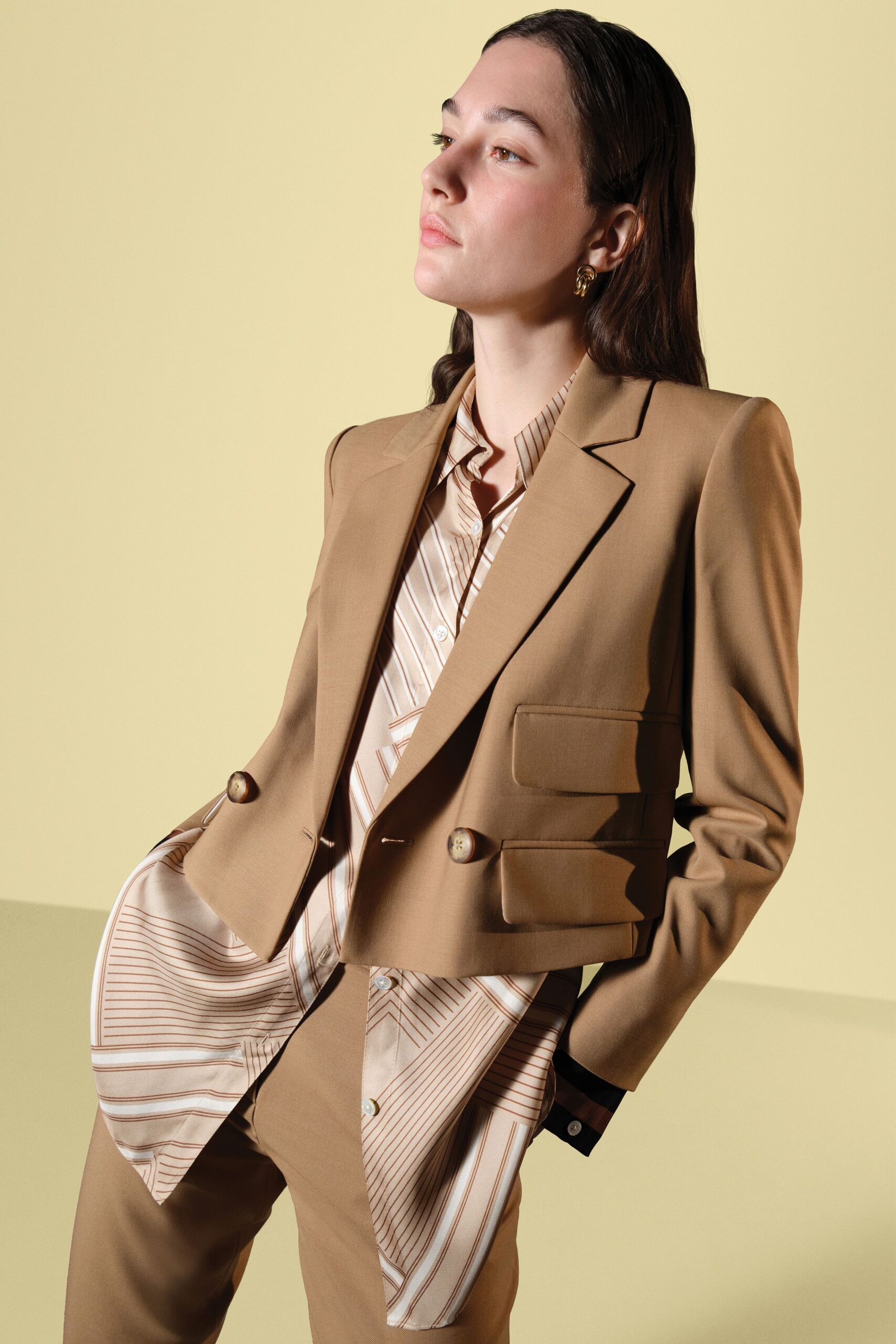 brown tailored blazer with striped shirt