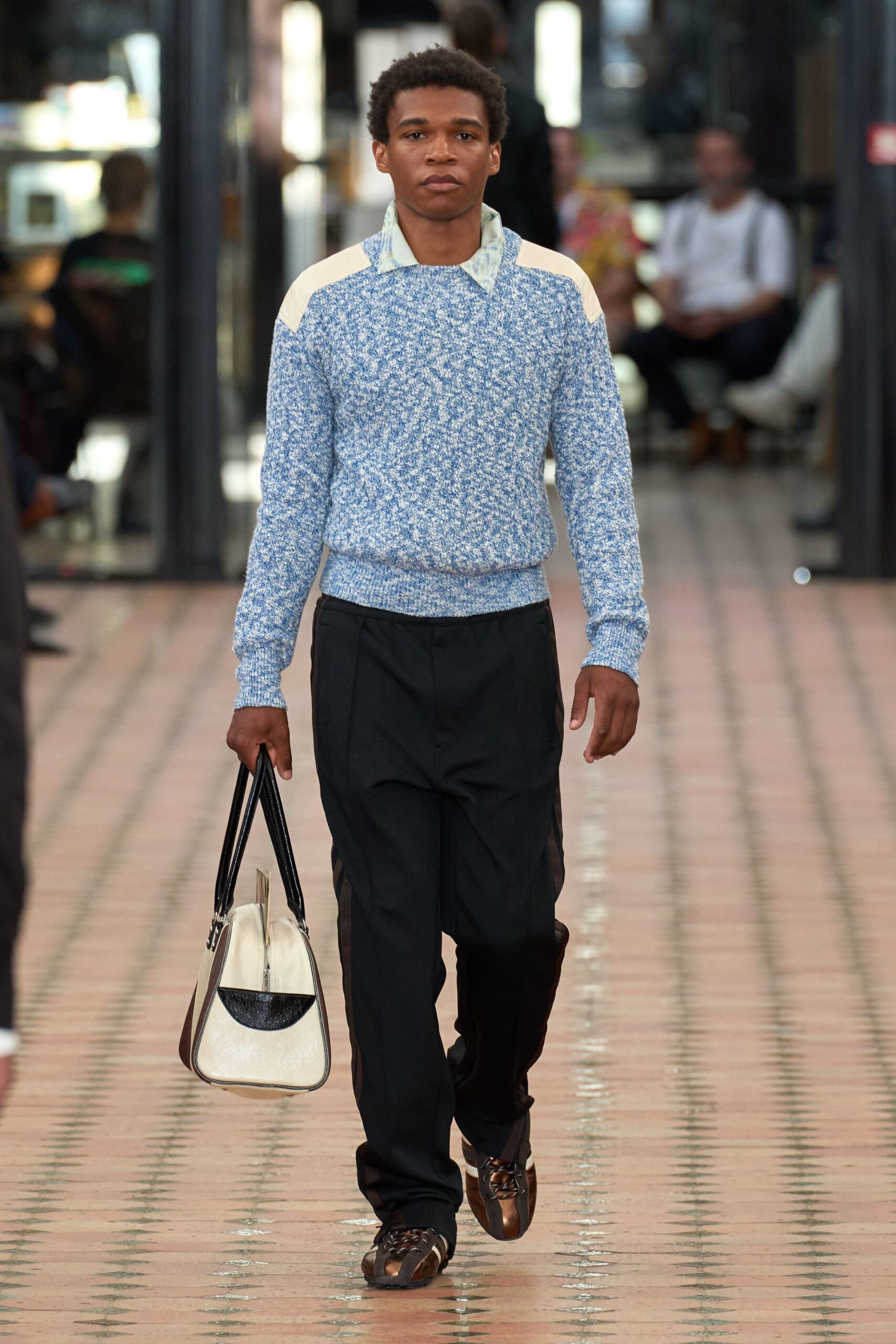 blue printed sweater with black pants