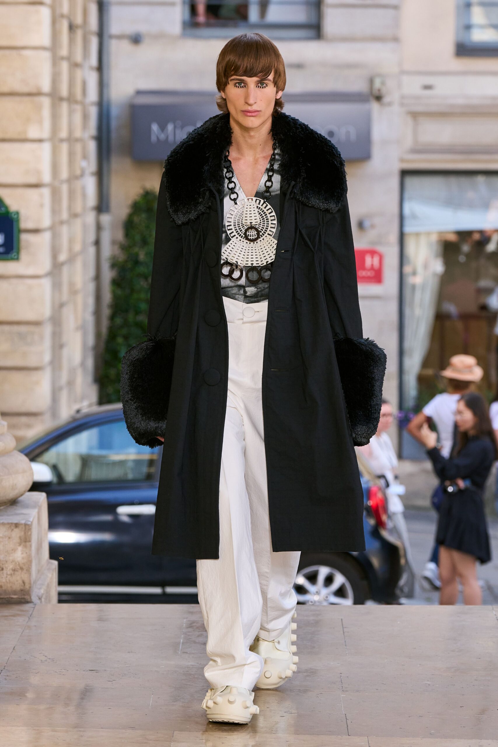 black coat white shirt tailored pants