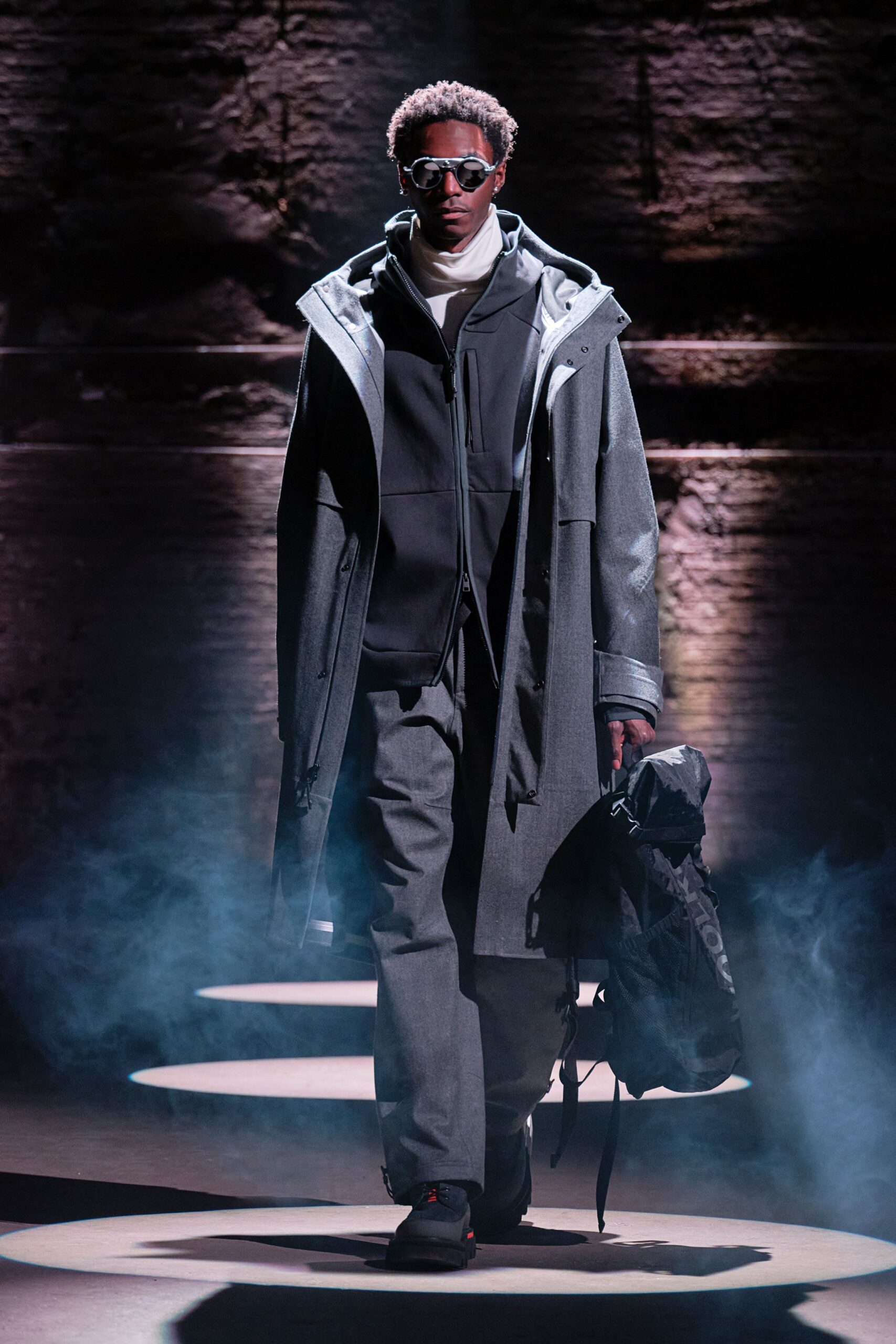gray coat and black hoodie outfit