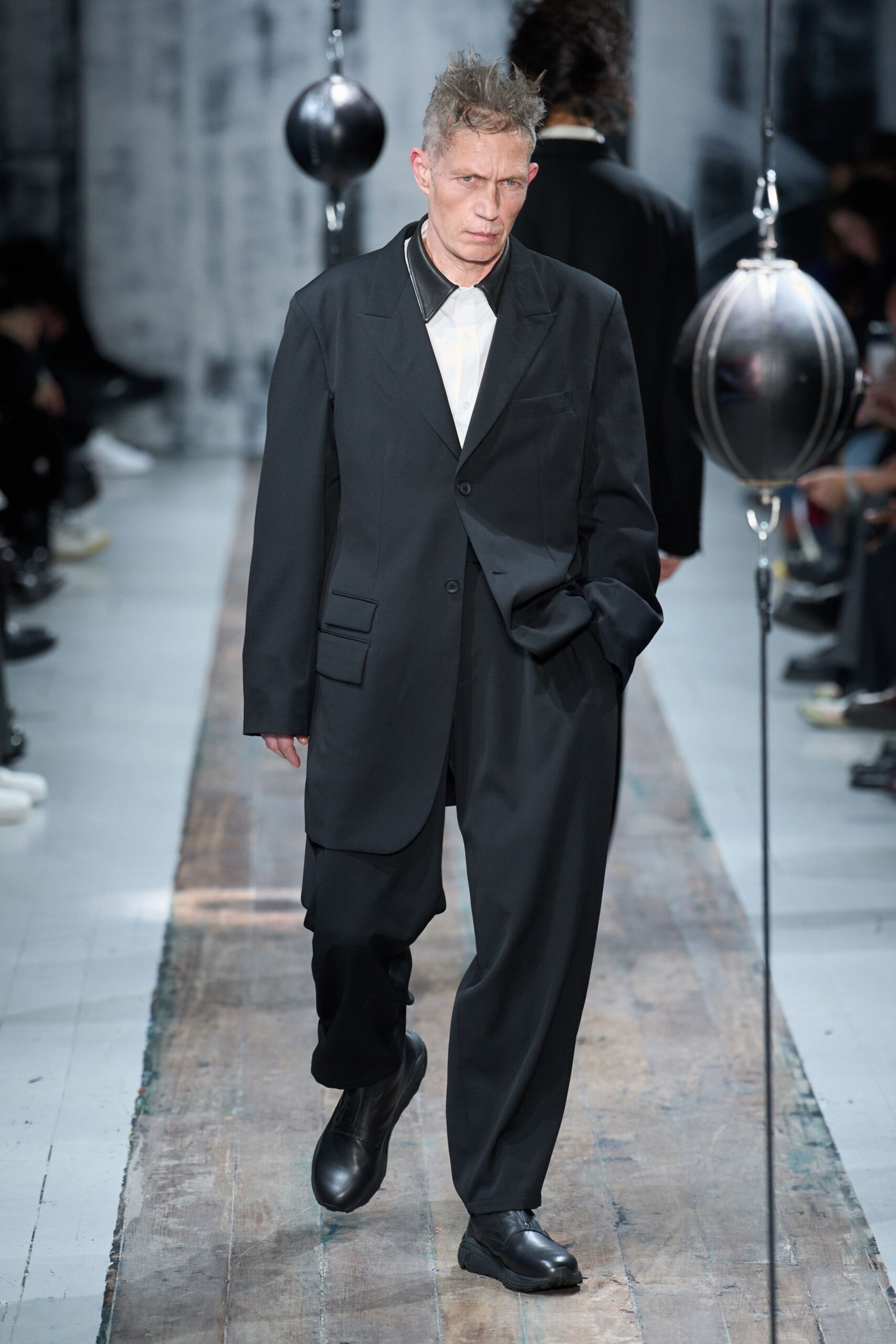 black relaxed suit with white shirt