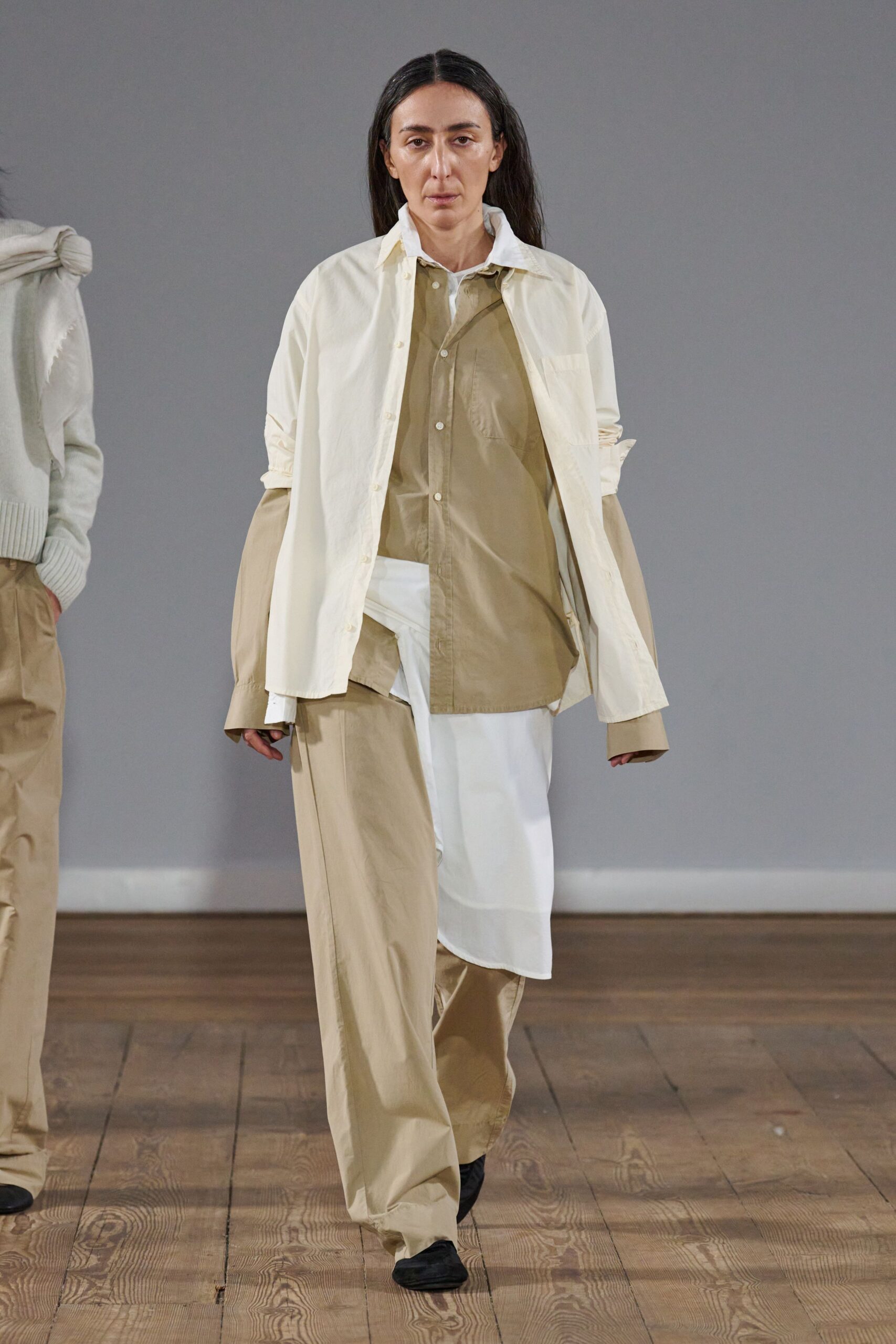 white and beige relaxed shirts with beige pants