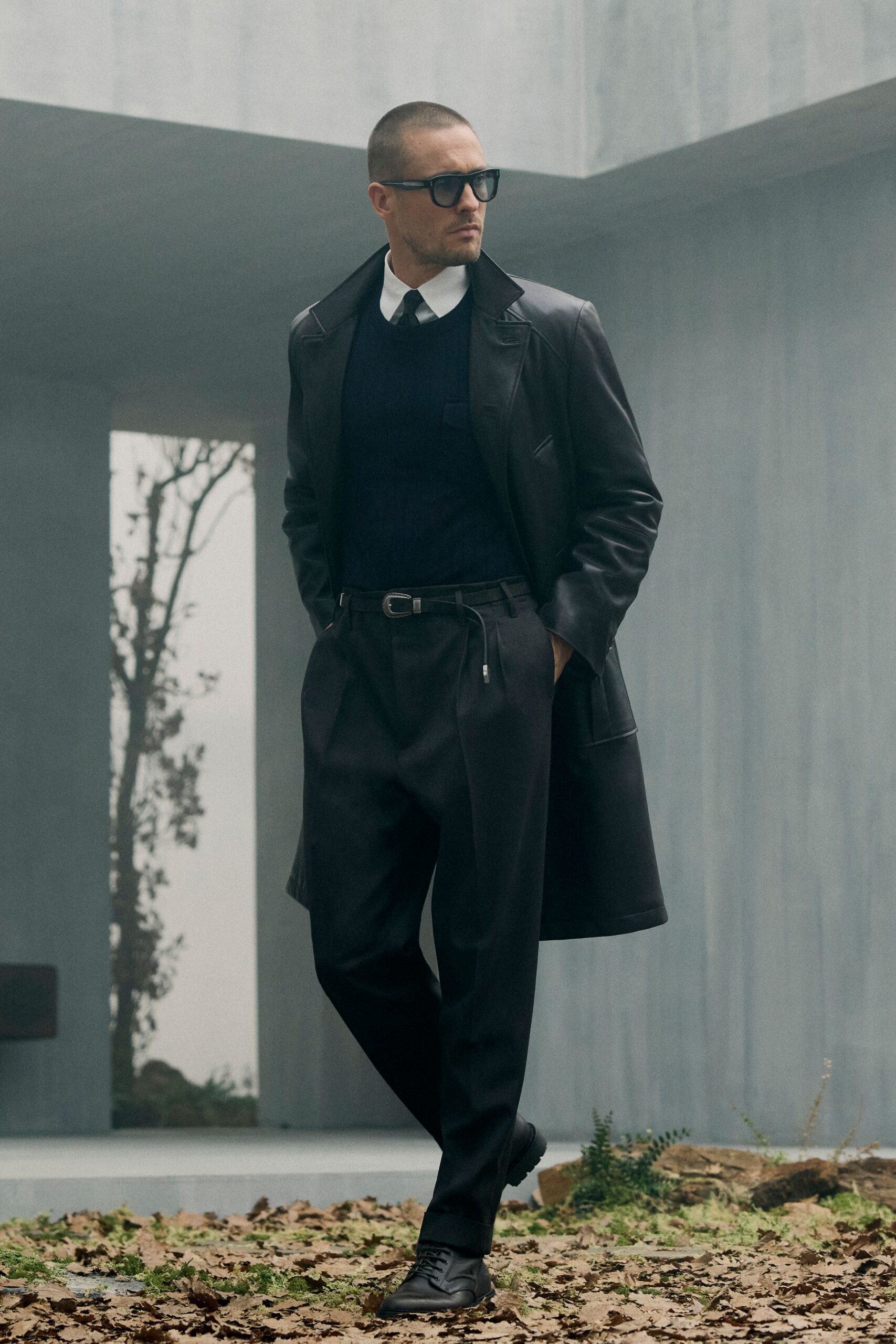 black leather coat with blue sweater