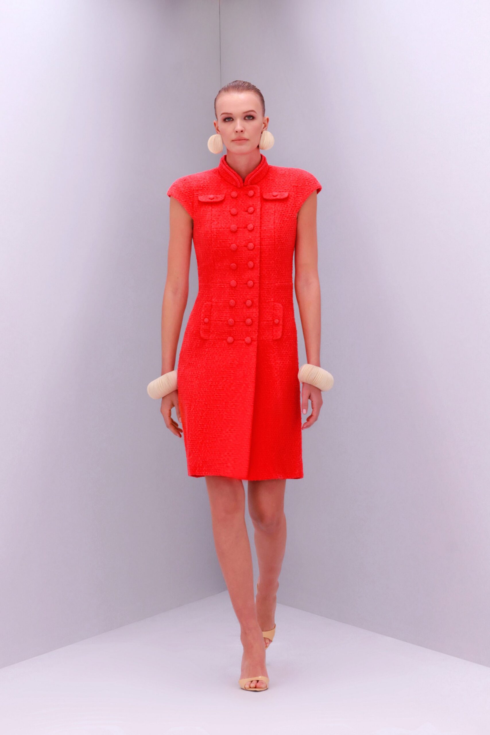 red cotton short-sleeve collared fitted buttoned pleated dress