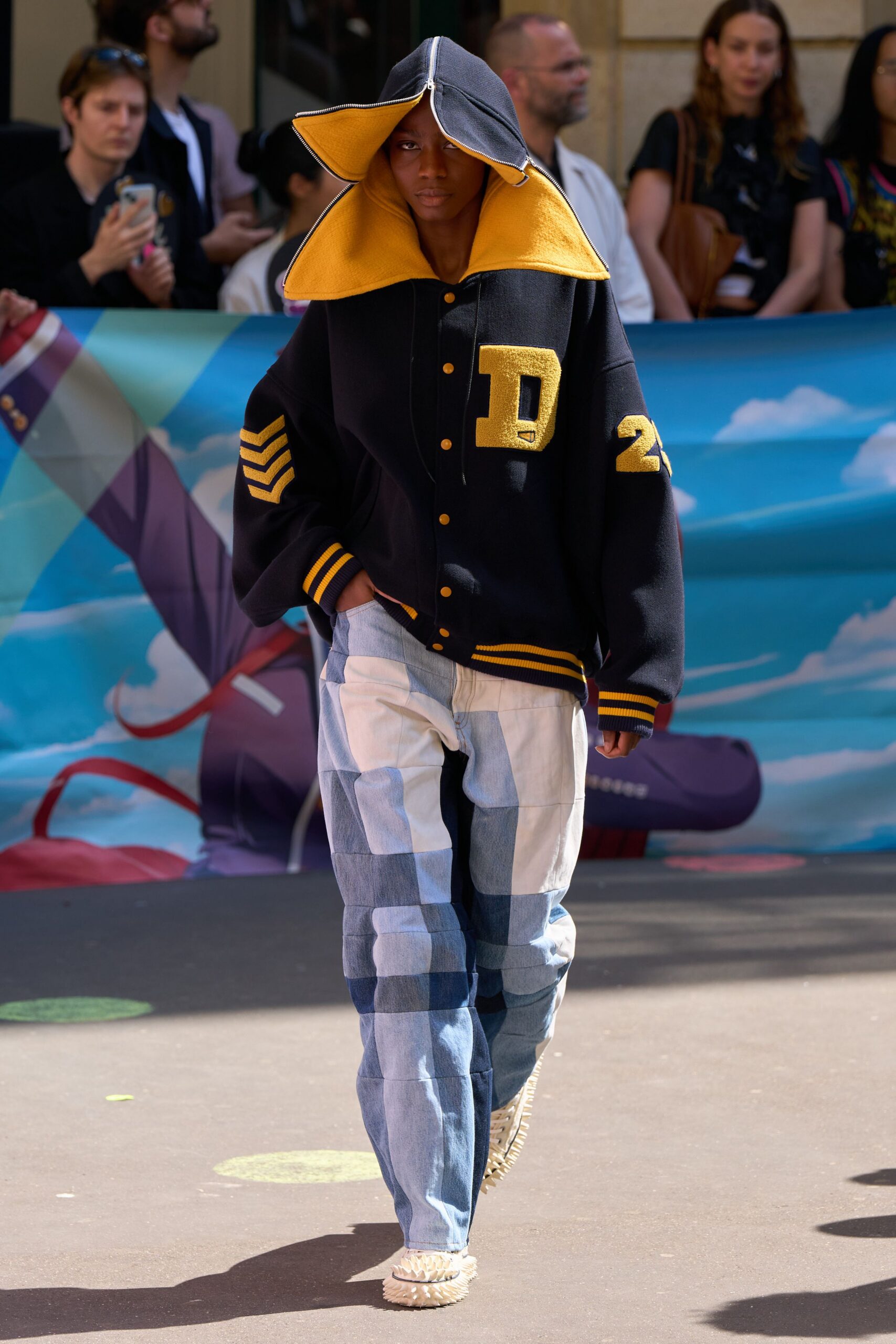black yellow hooded jacket with patchwork pants