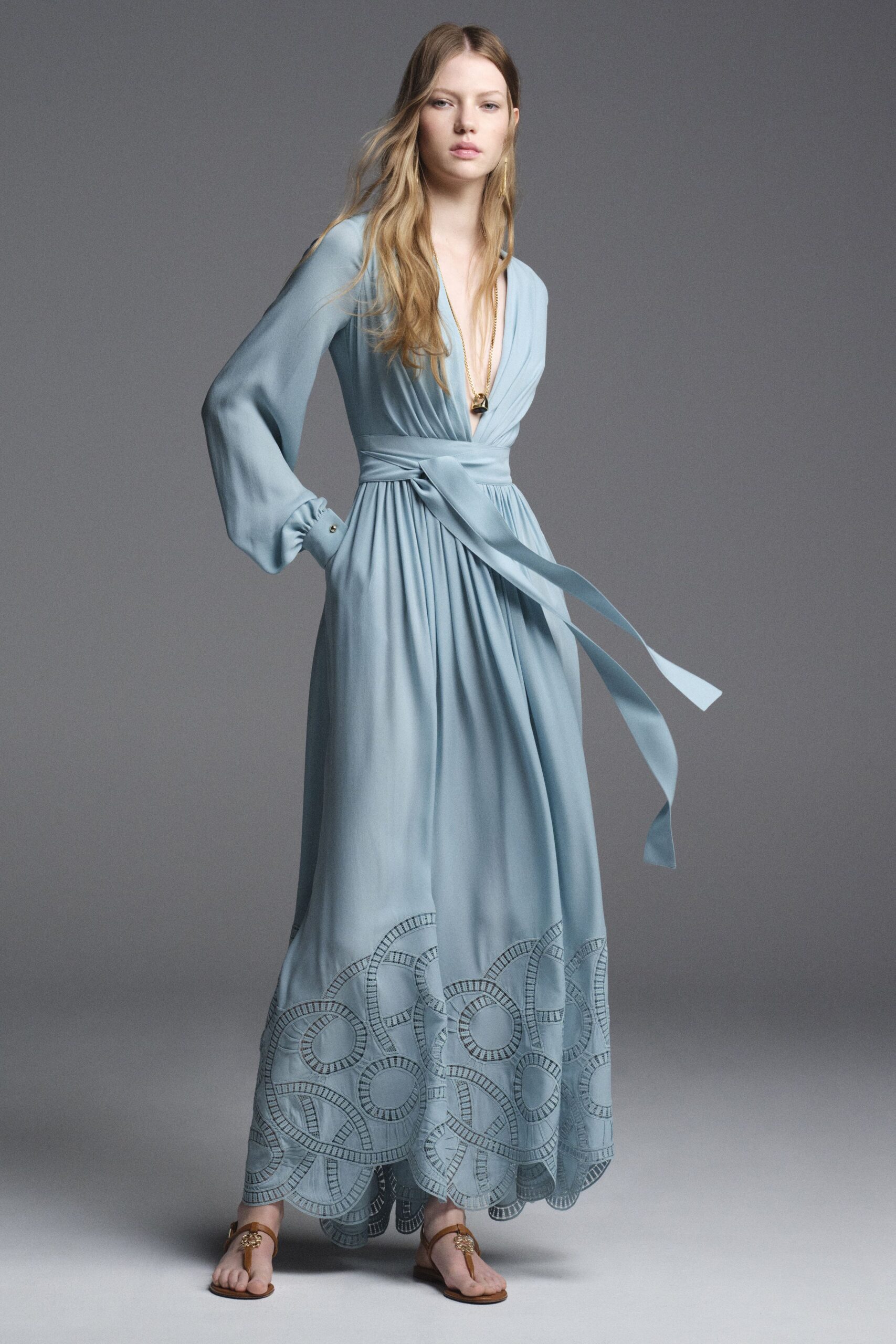 blue silk long-sleeve v-neck fitted belted embroidered gown
