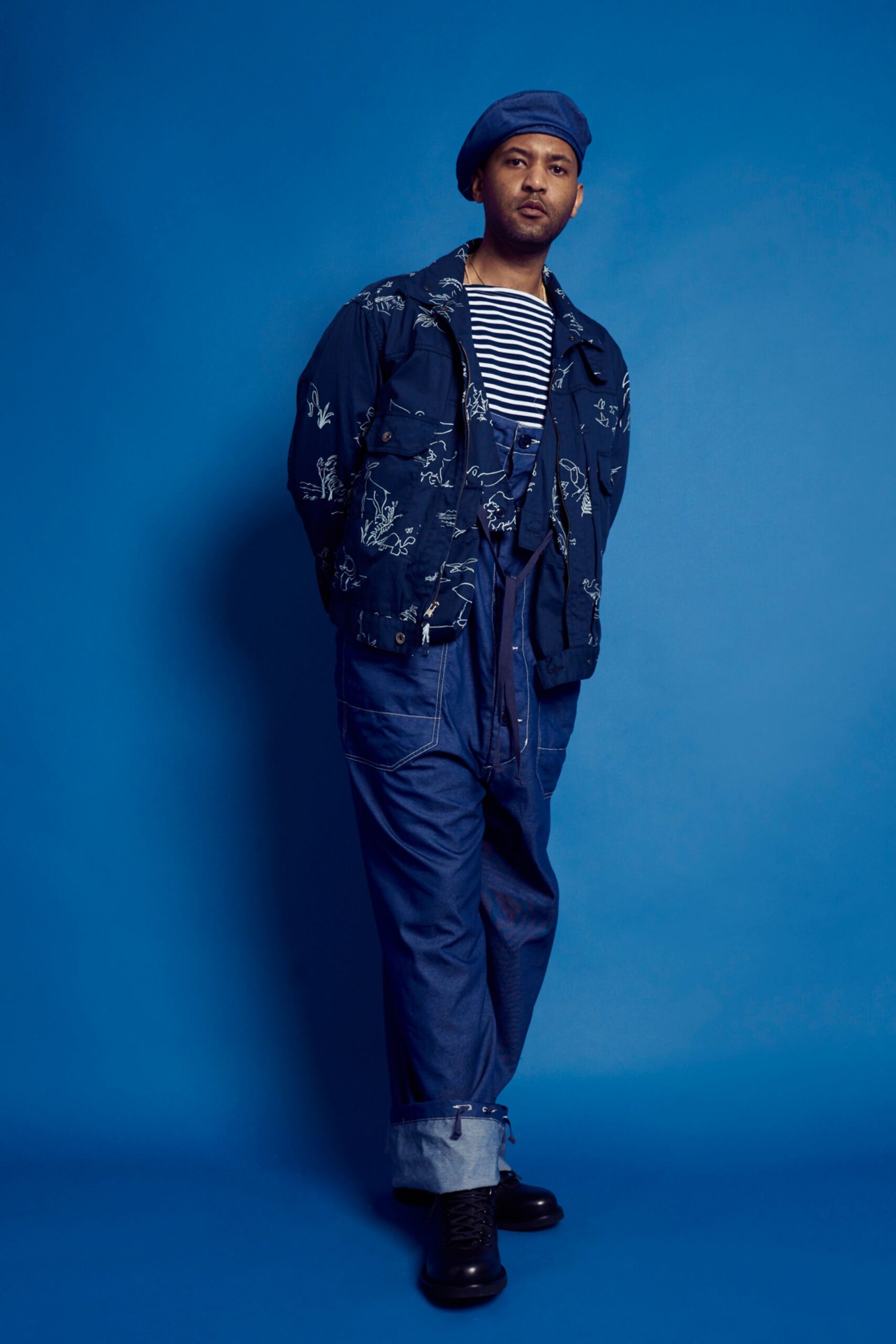 blue embroidered jacket with overalls