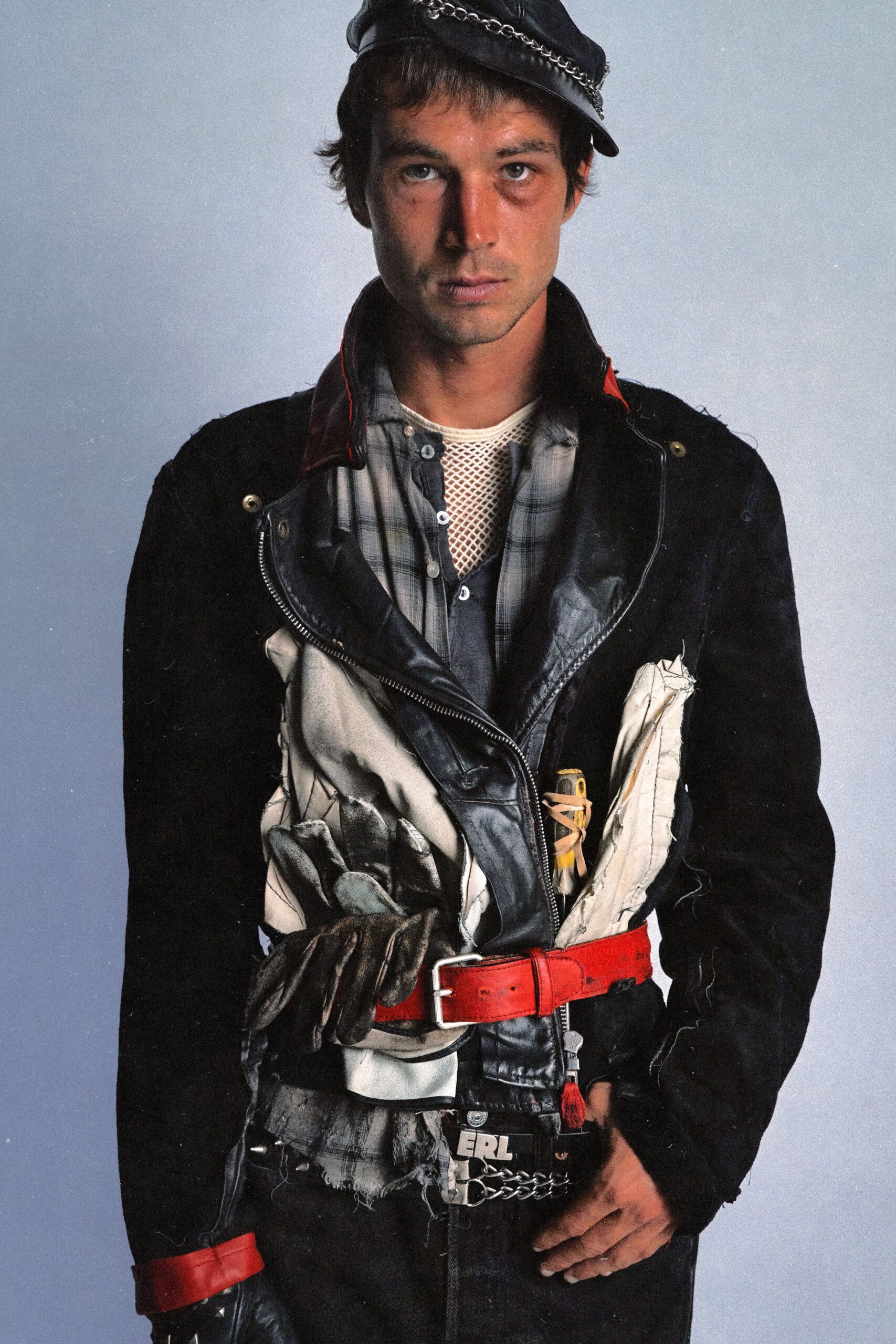 black leather jacket with red belt