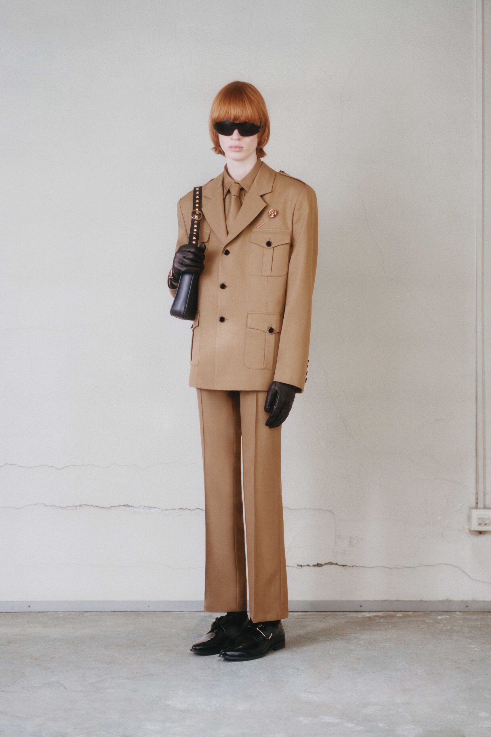 brown tailored suit with accessories
