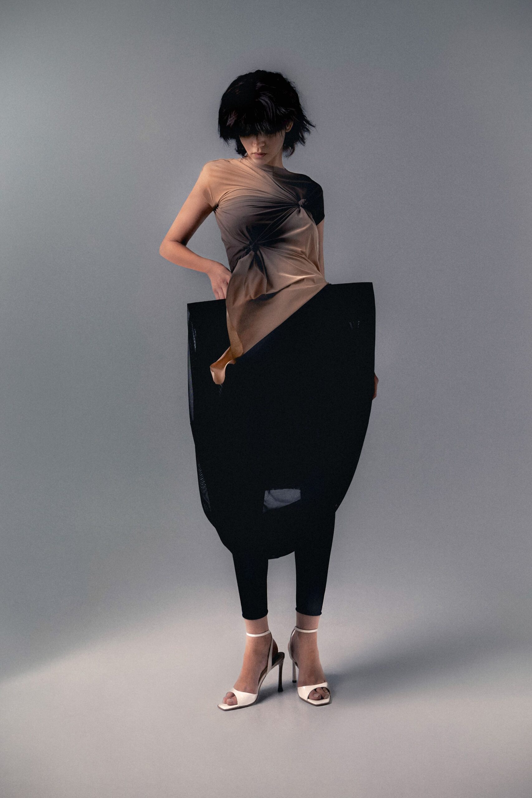 beige silk sleeveless asymmetric fitted draped top