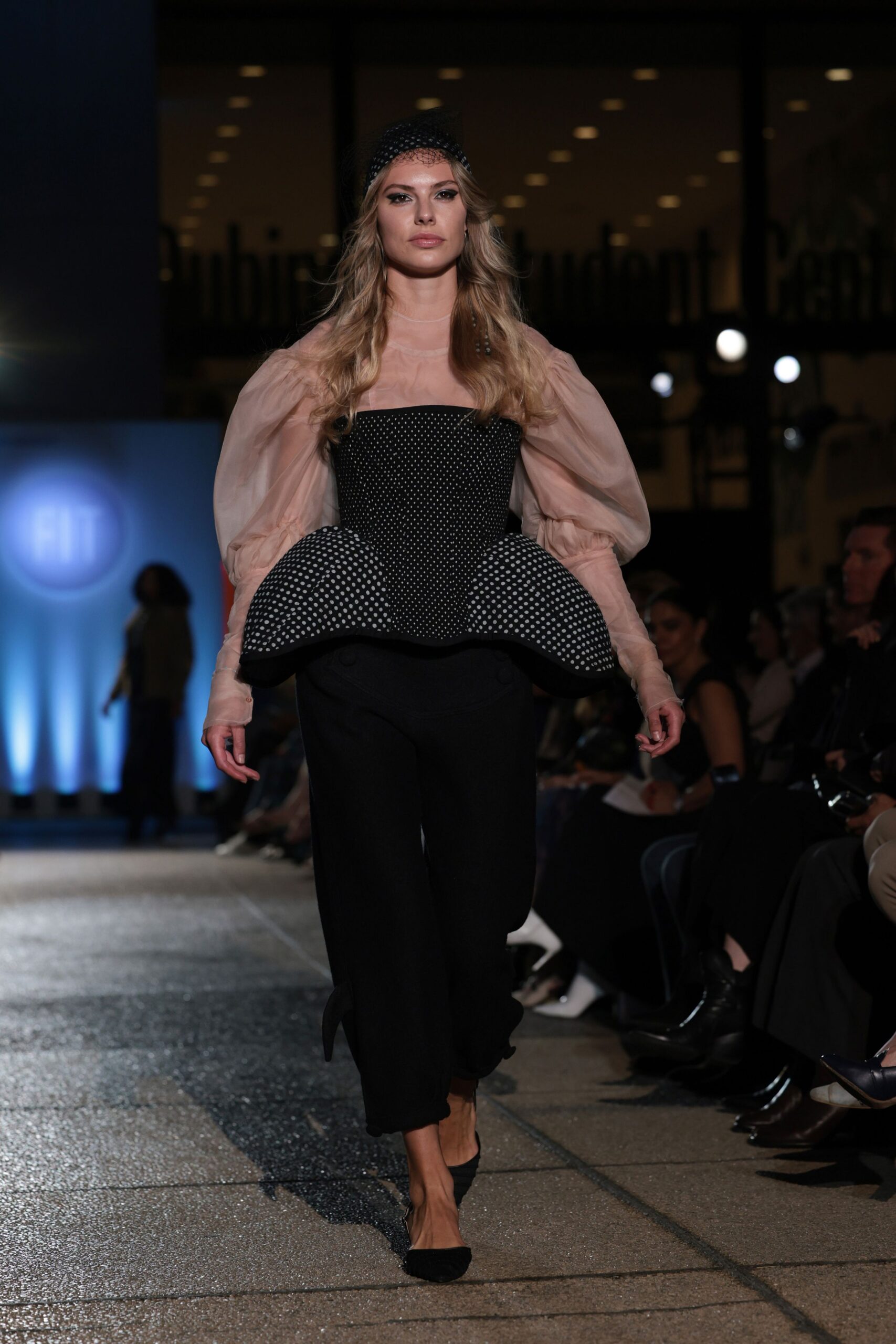 black and beige fitted top with relaxed pants