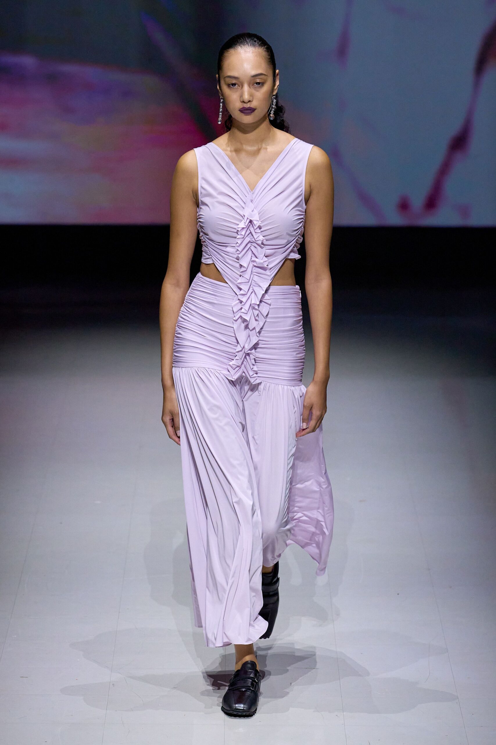 lavender ruched jumpsuit with black shoes