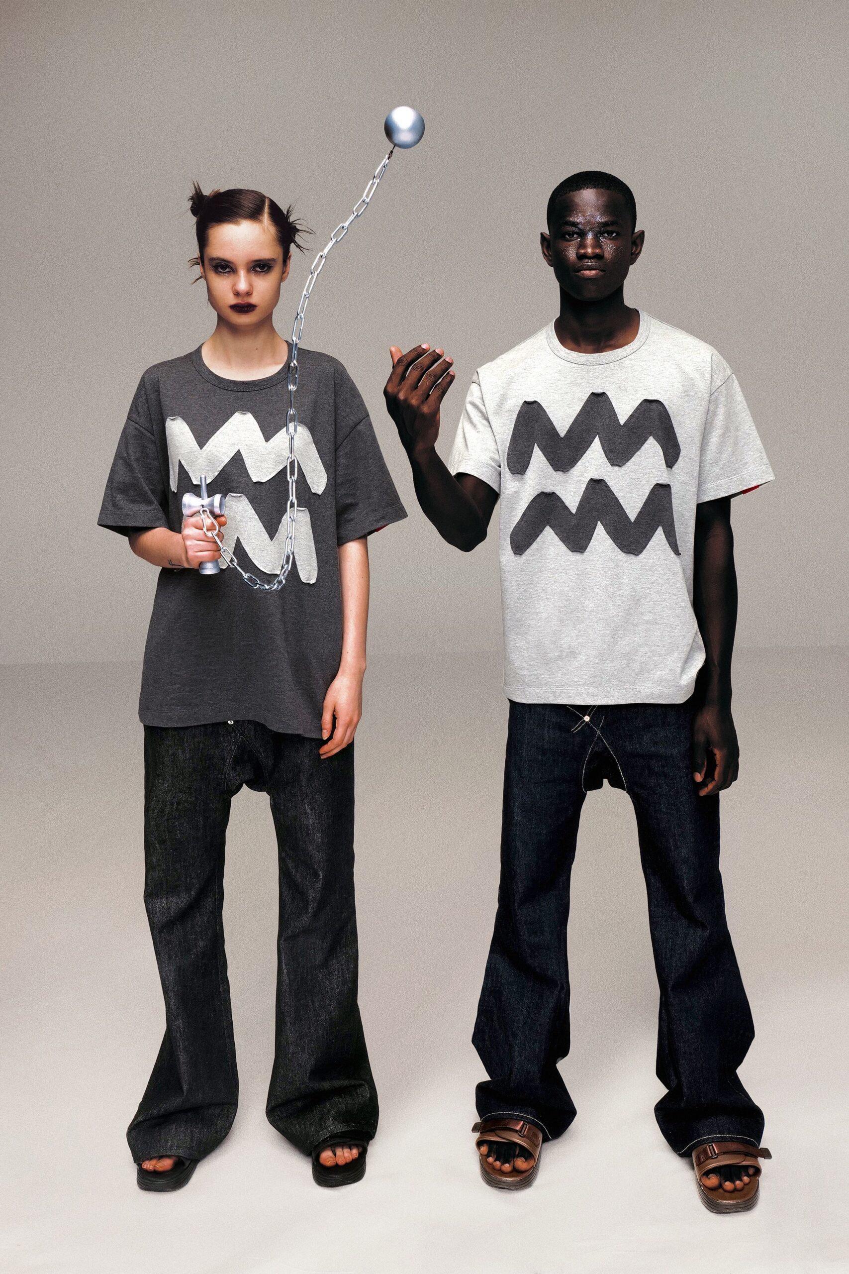 gray and white printed t-shirts with relaxed jeans