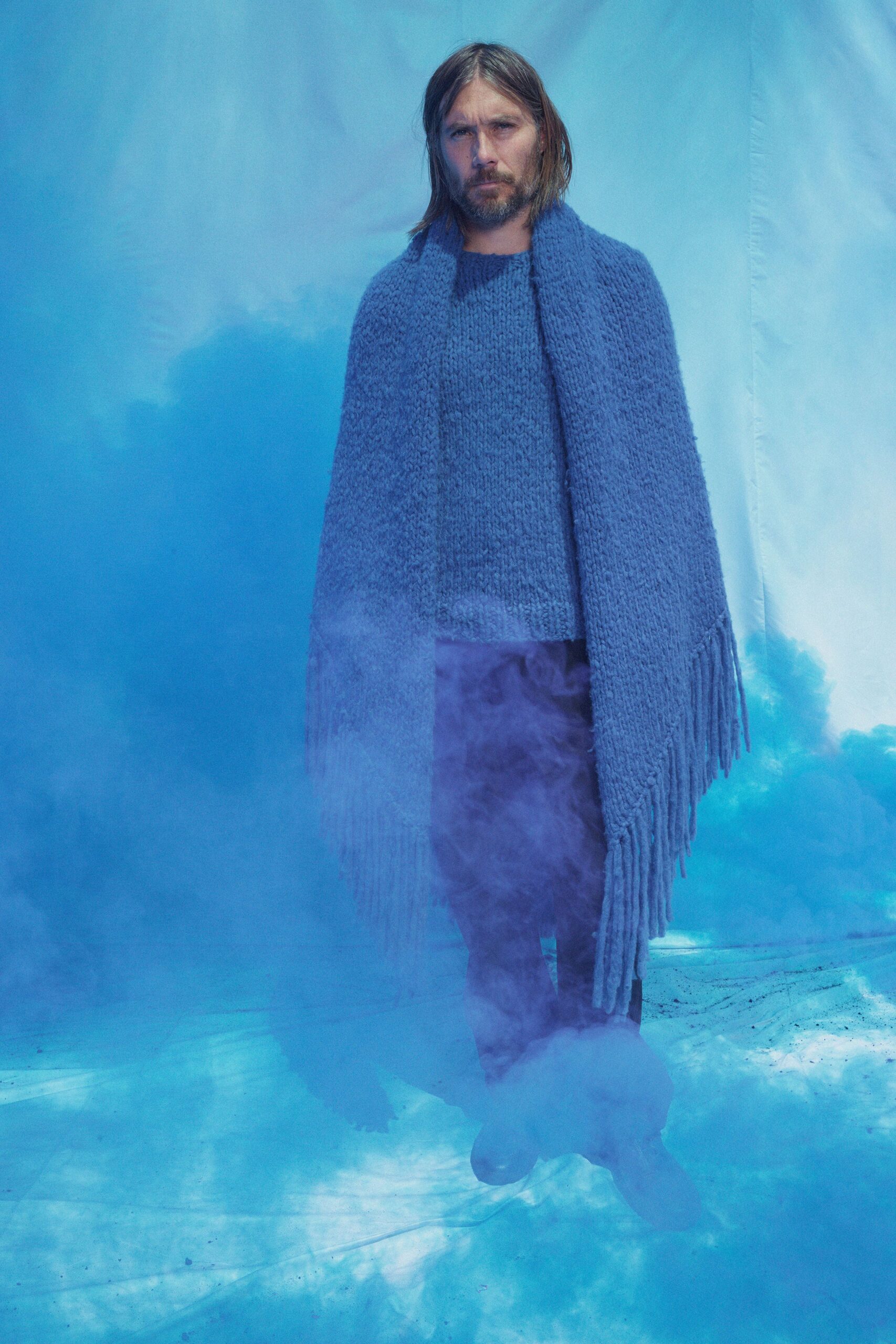 blue wool sweater and cape