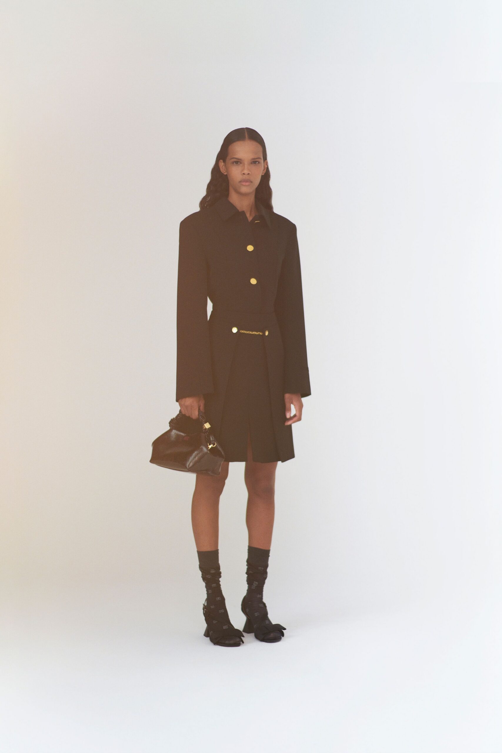 black cotton long-sleeve collared fitted buttoned pleated dress