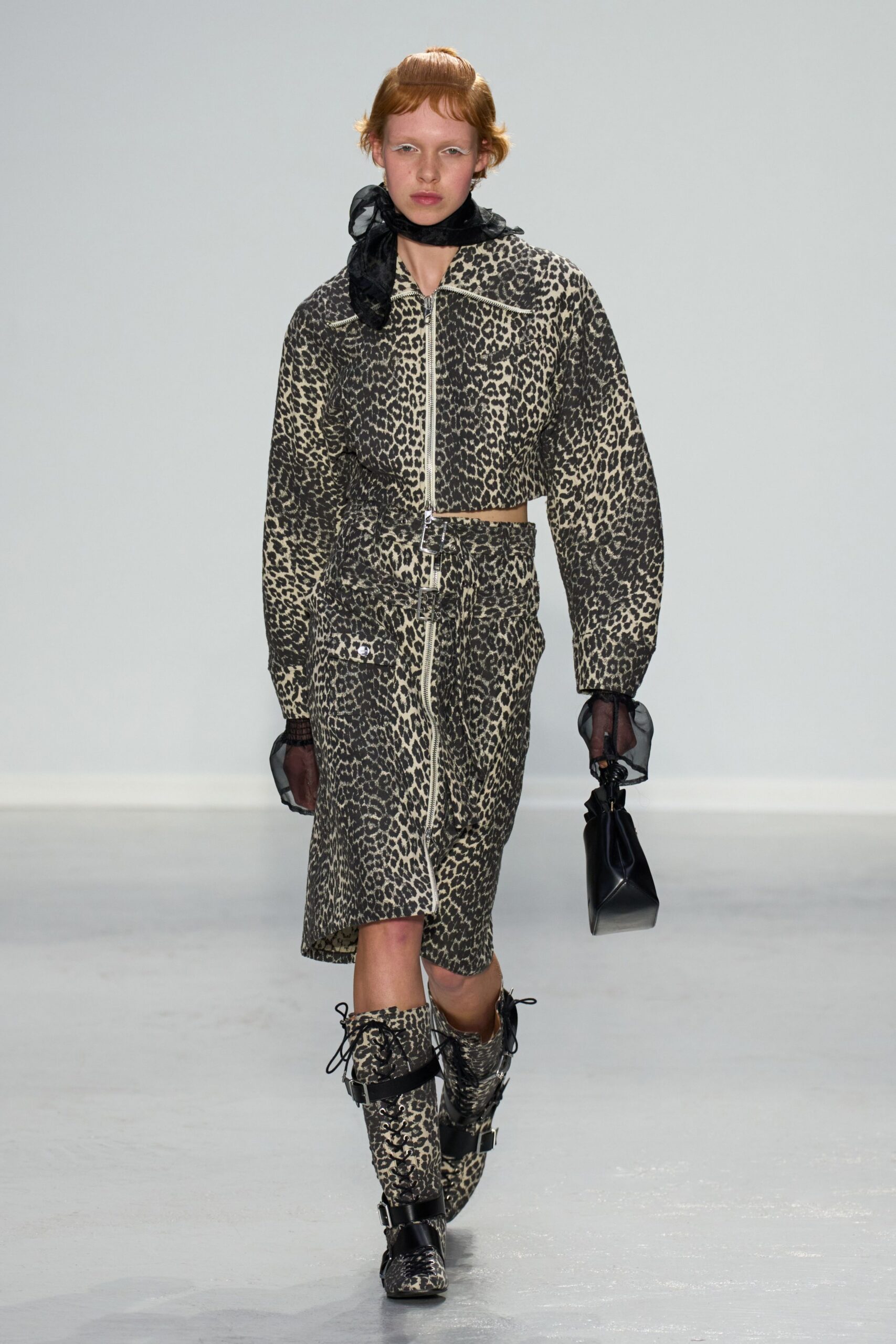 animal-print midi dress with boots