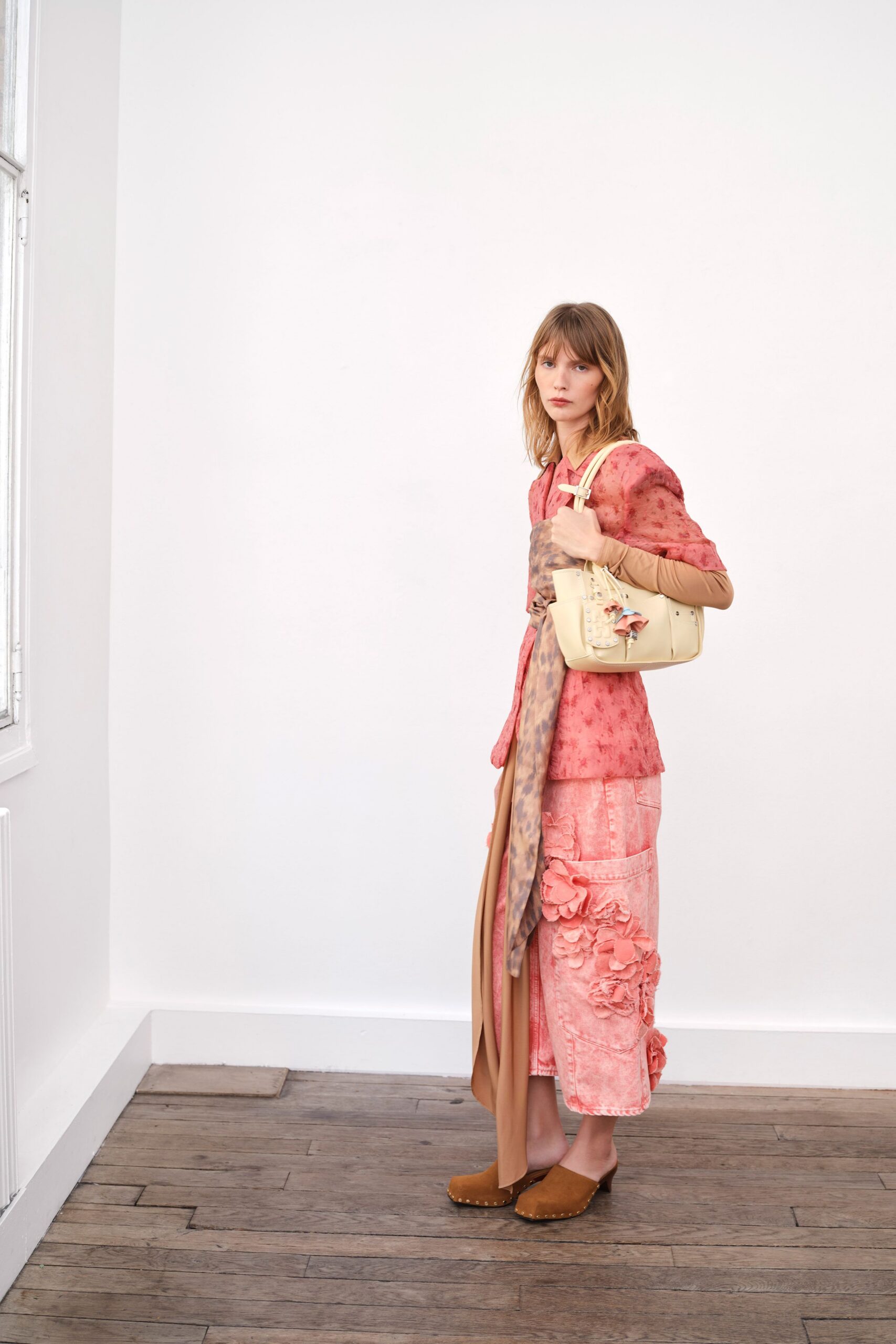pink embroidered top with tiered skirt