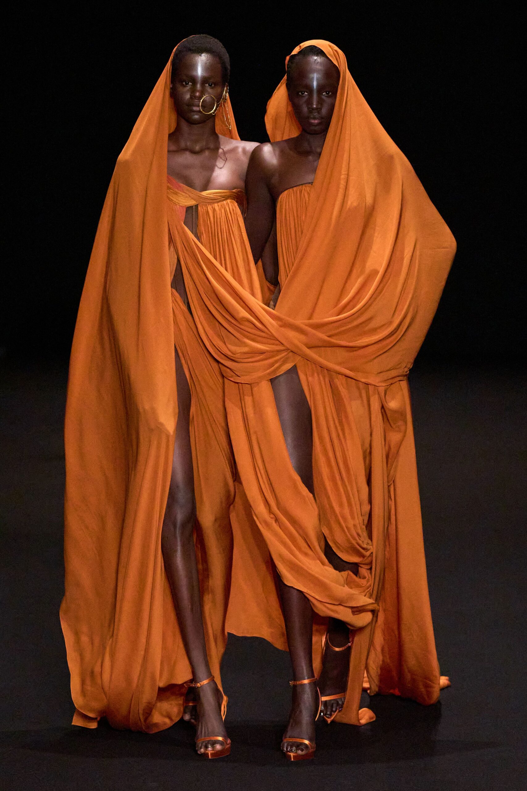 orange silk draped gowns