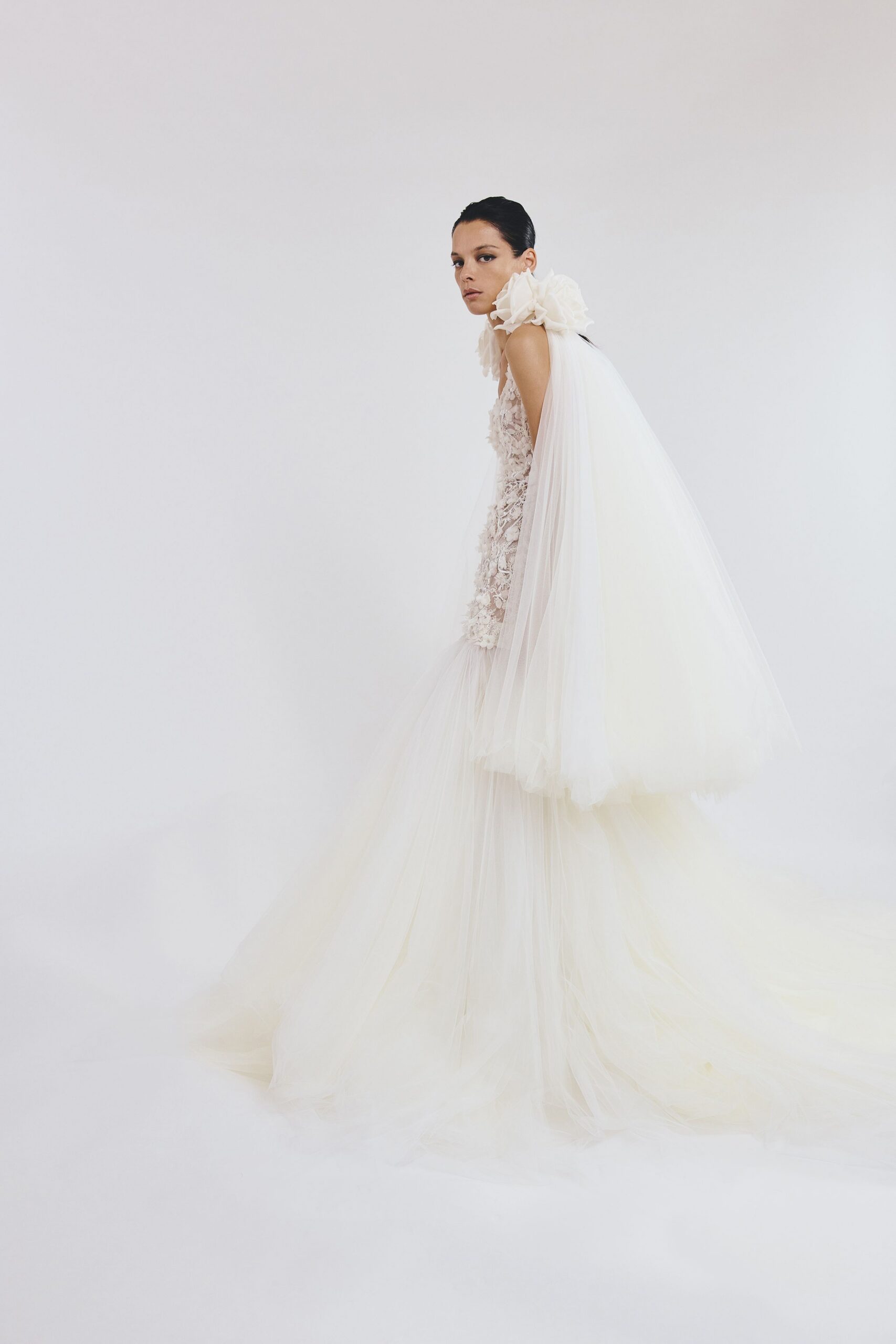 white tulle gown with cape