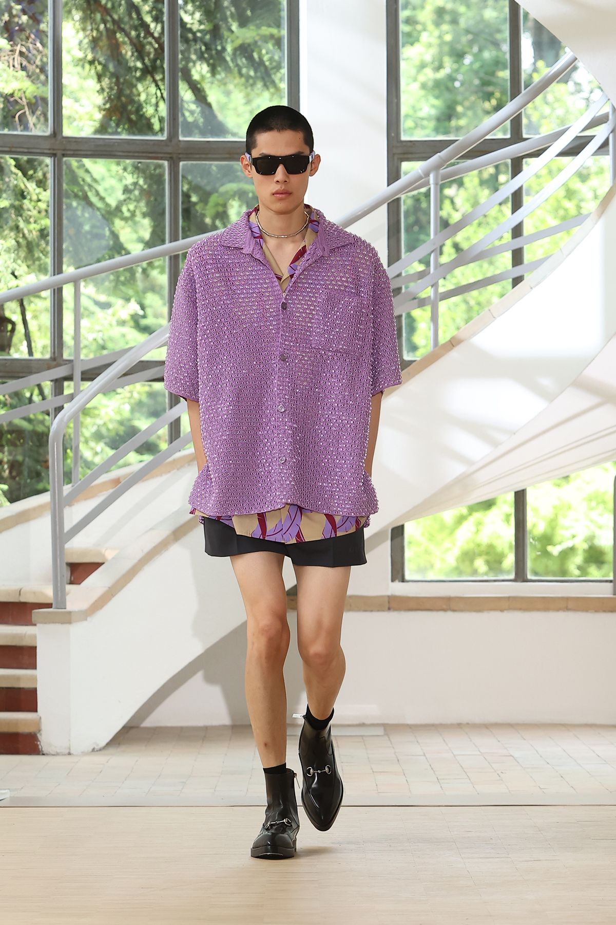 purple relaxed shirt with black shorts