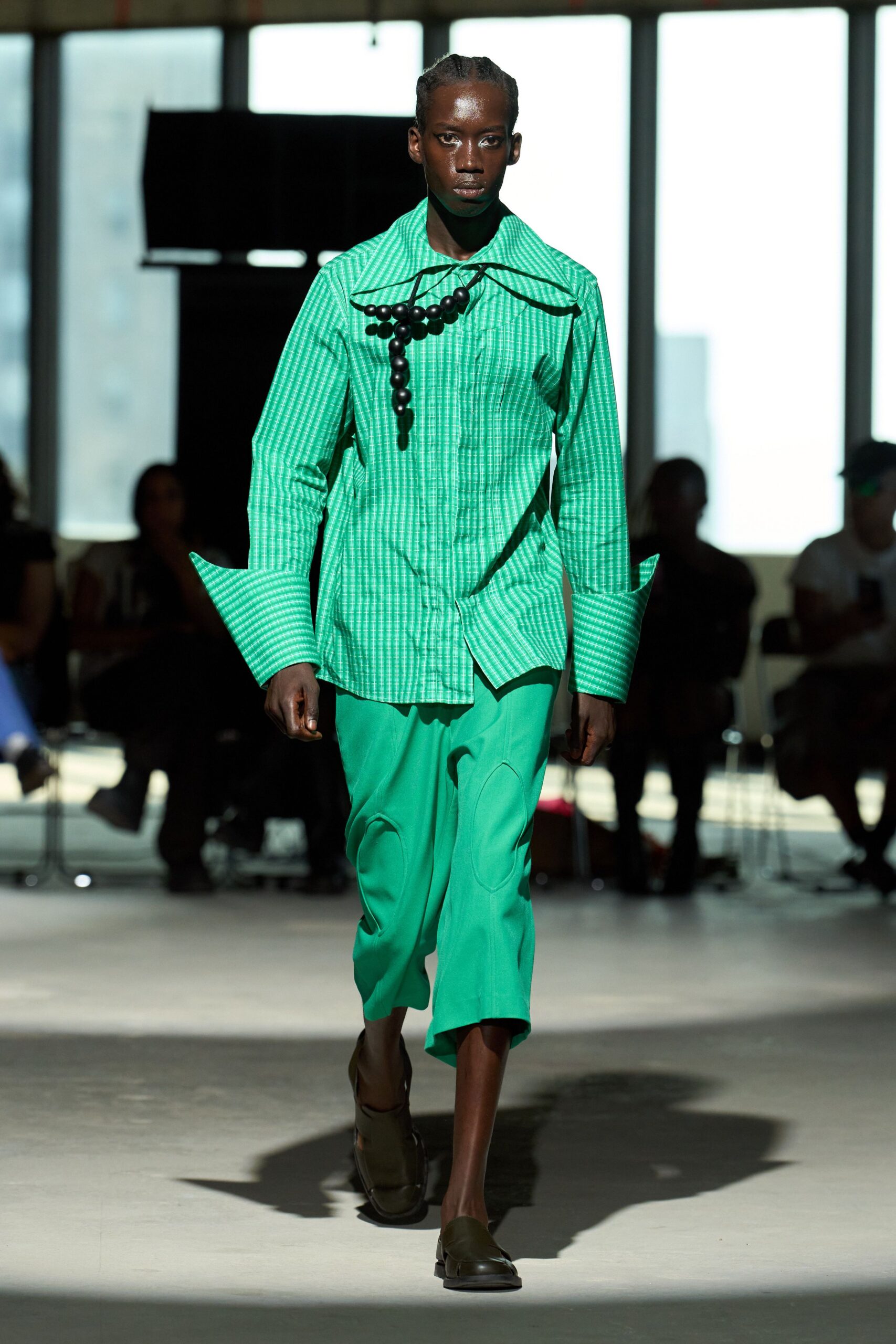 green striped shirt and relaxed pants