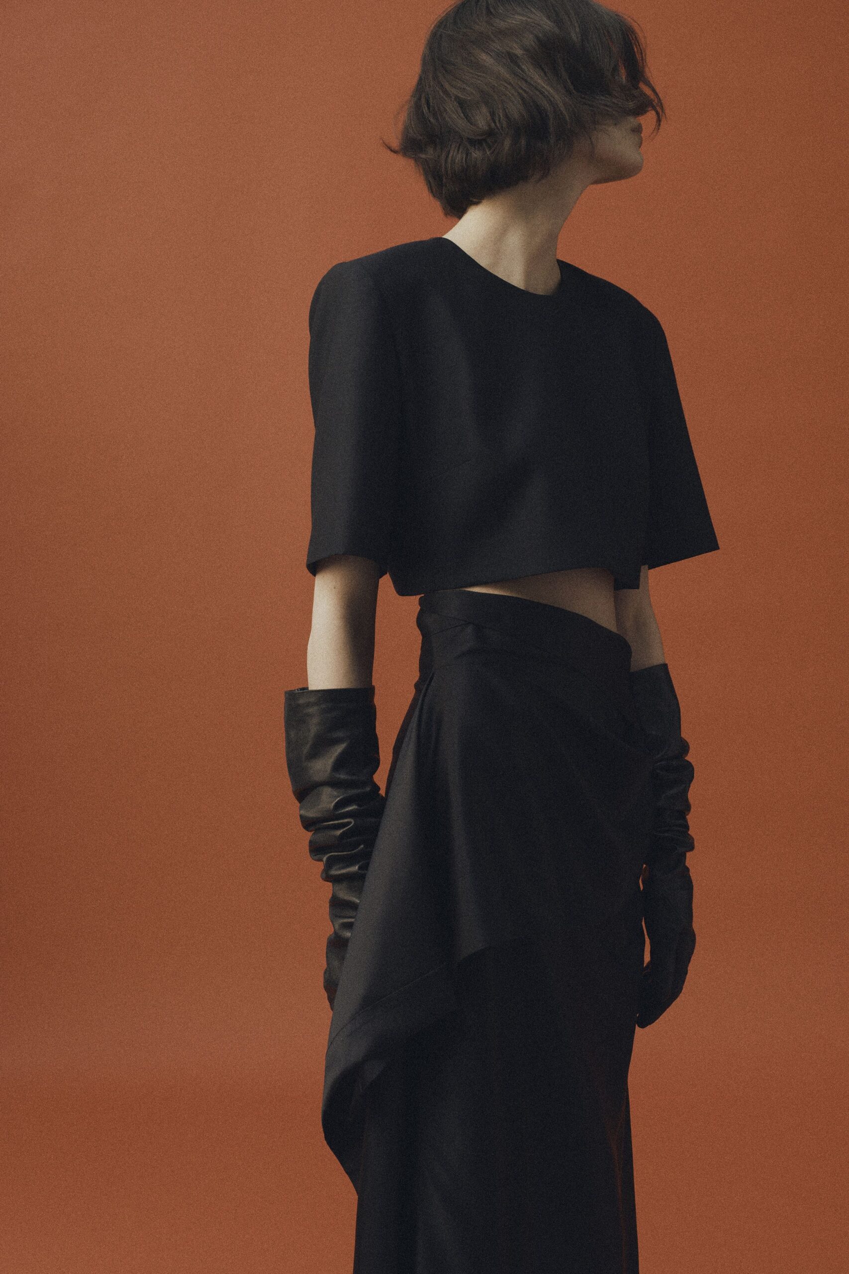 black crop-top and skirt
