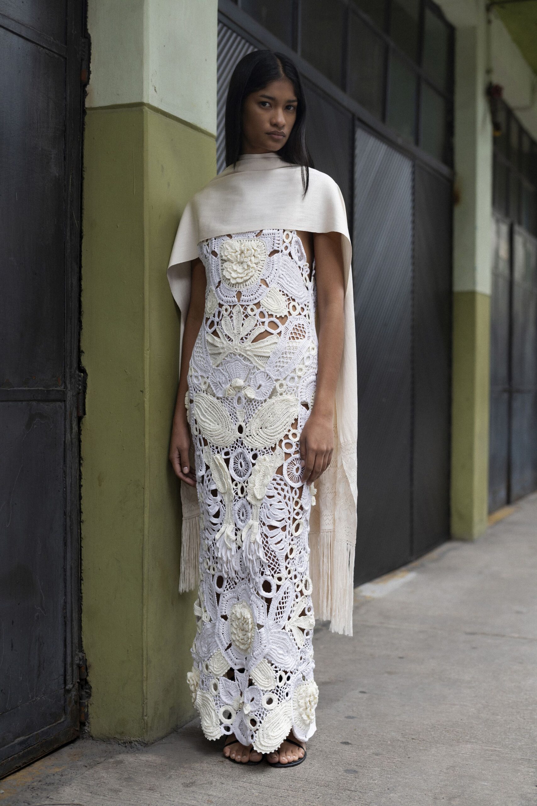 white cotton sleeveless high-neck fitted embroidered layered gown