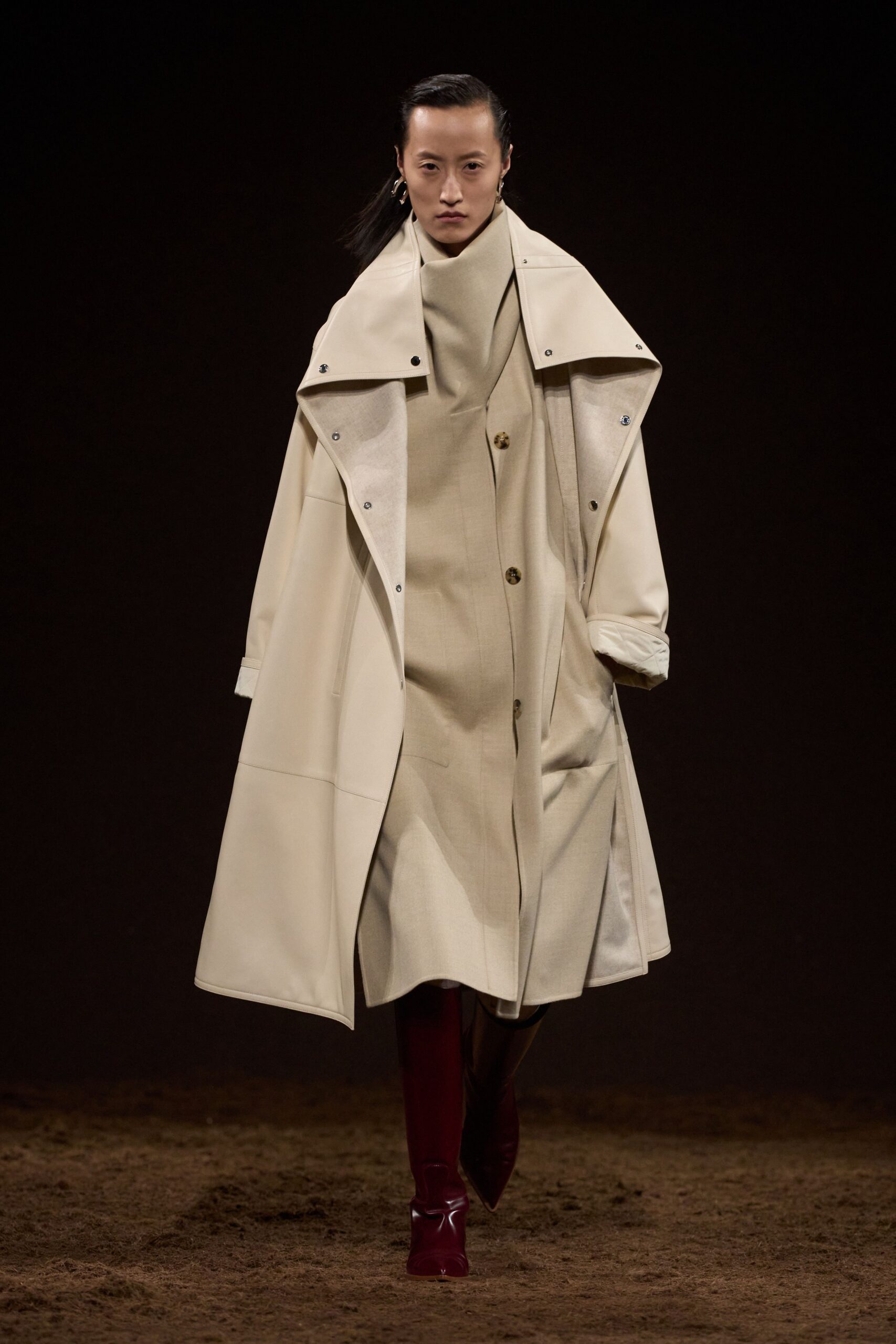 white coat beige dress red boots