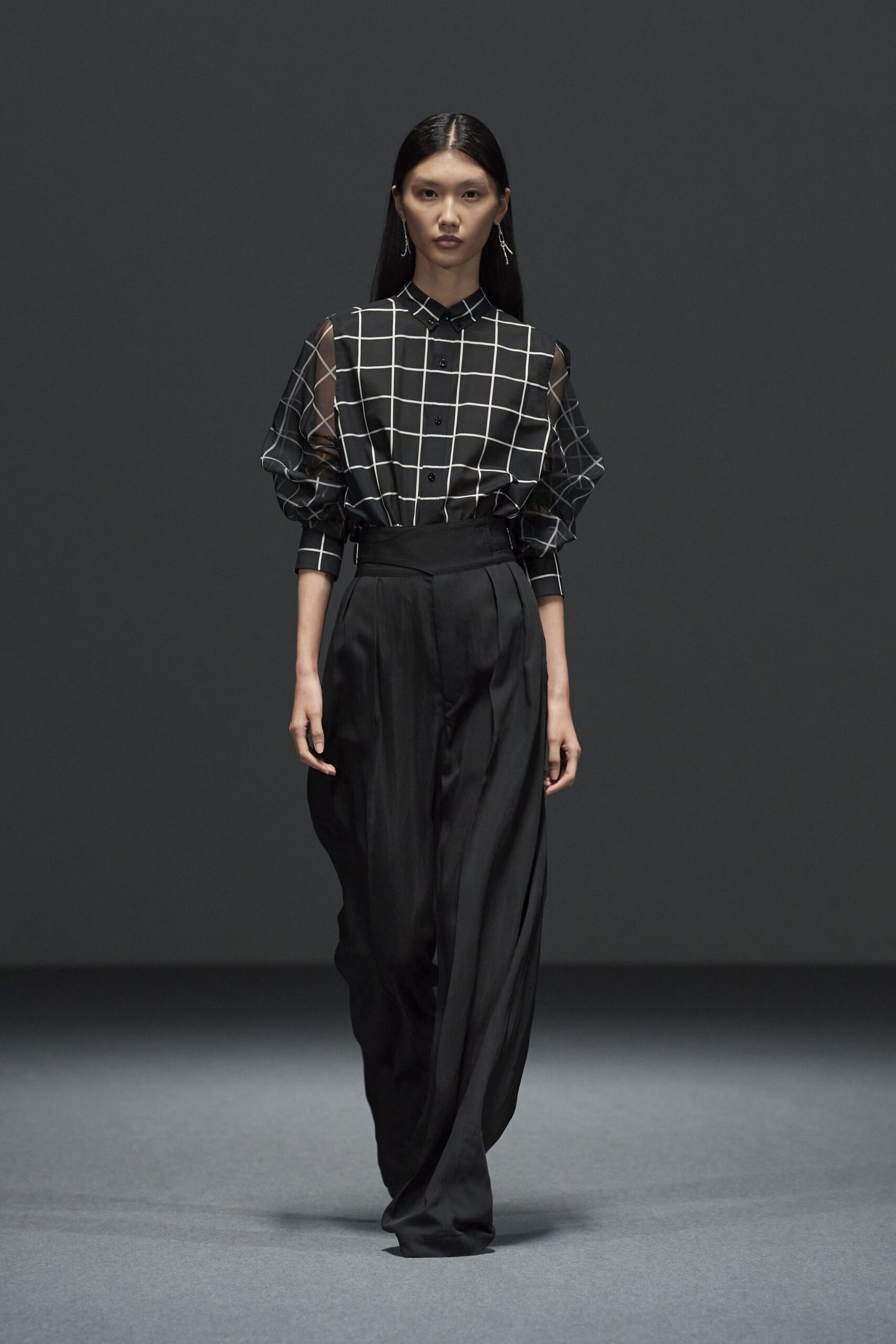 black and white checked shirt with wide-leg pants