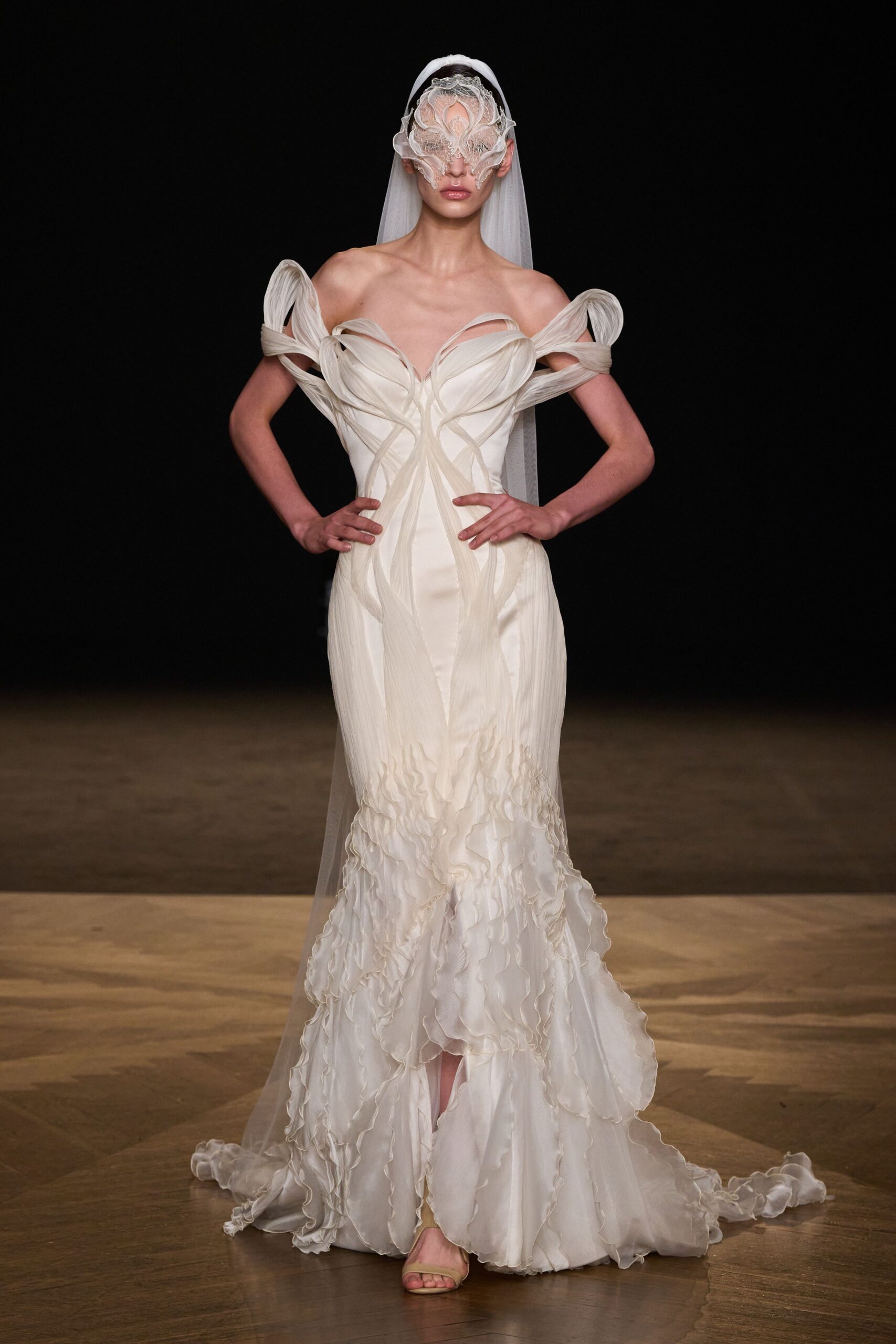 white silk off-shoulder long-sleeve fitted ruffled layered gown