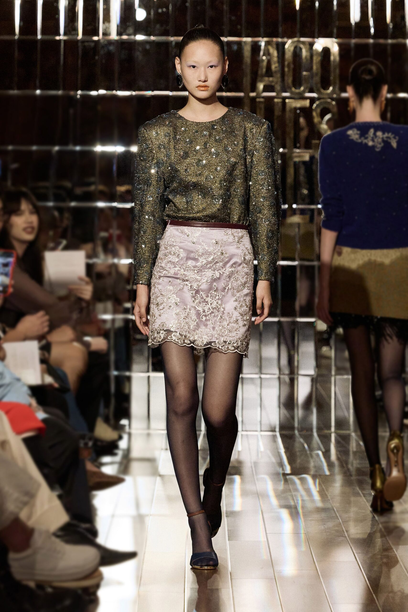 gold embroidered fitted top with pink lace mini skirt