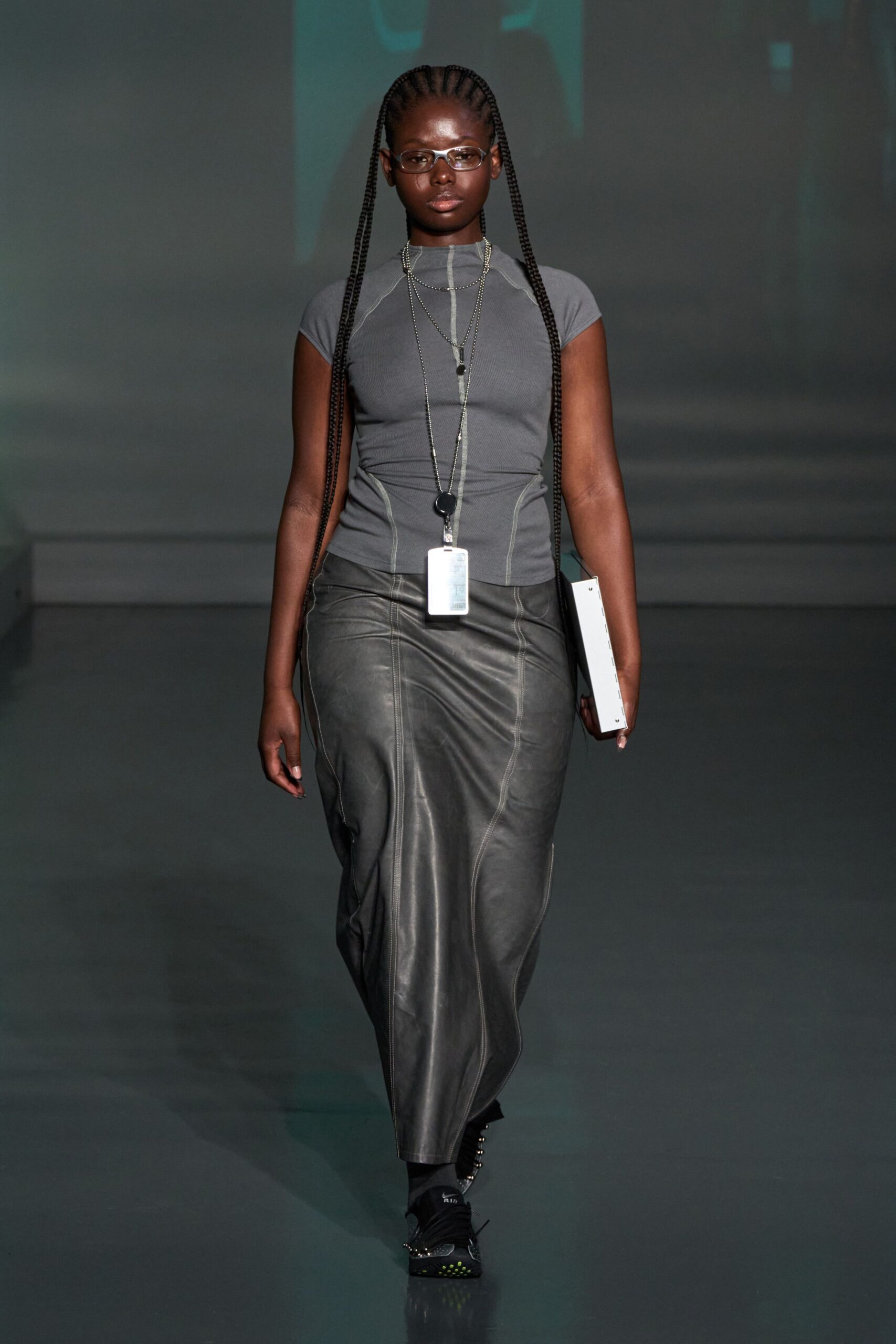 gray fitted top black leather skirt