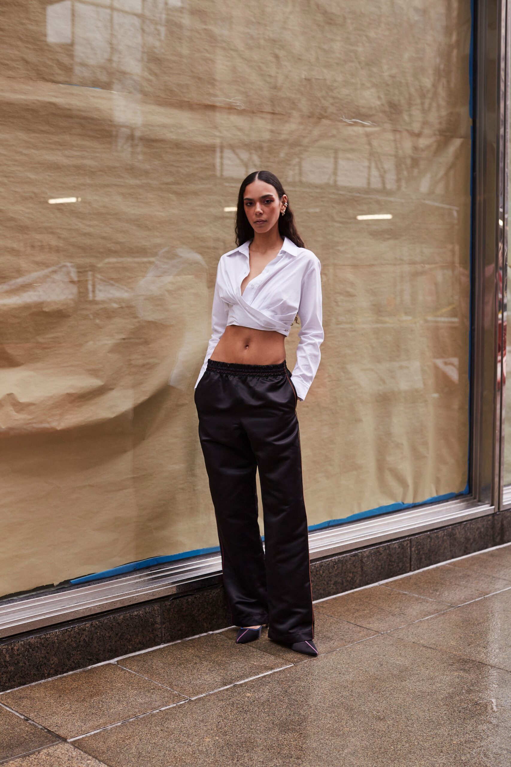 white fitted shirt black relaxed pants