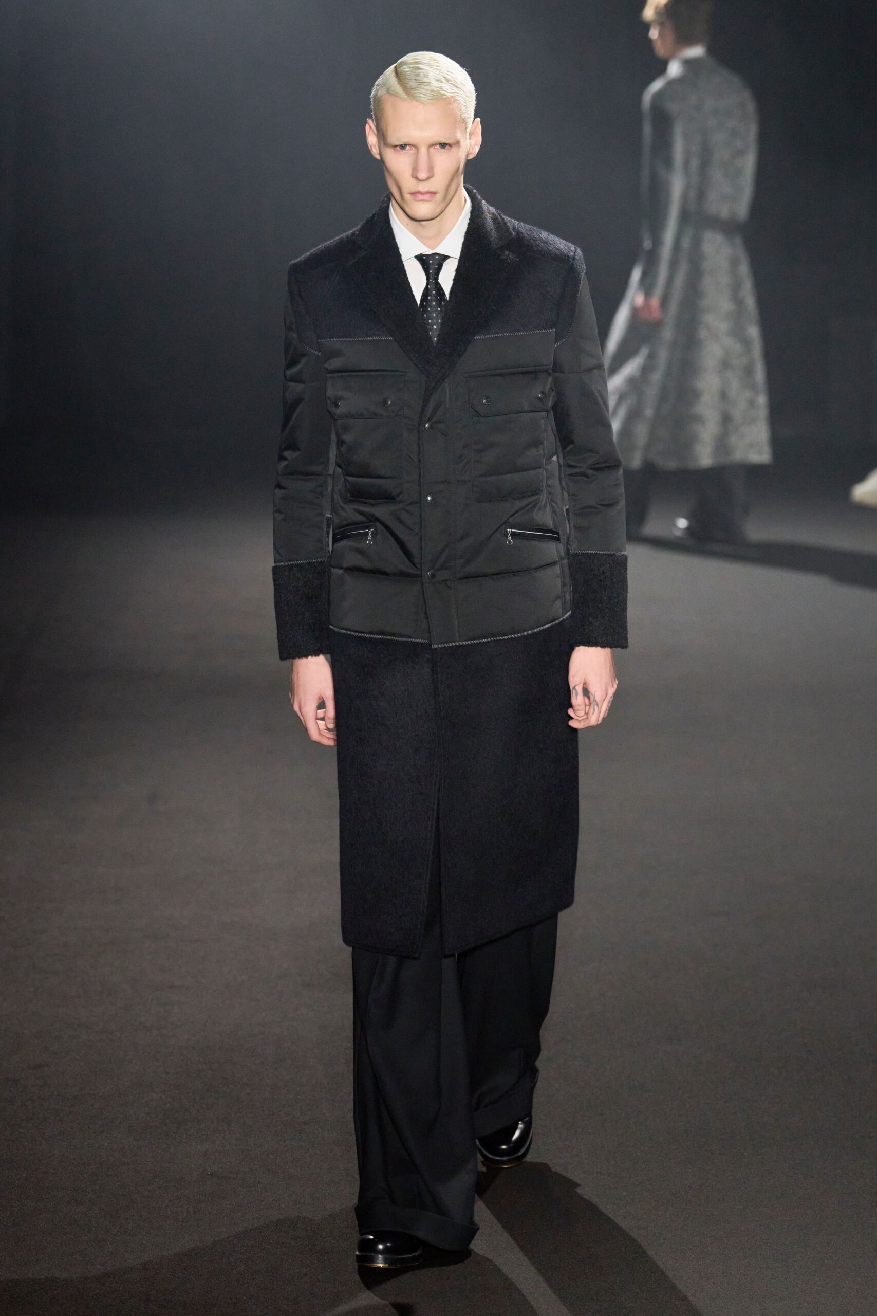 black structured coat with relaxed pants