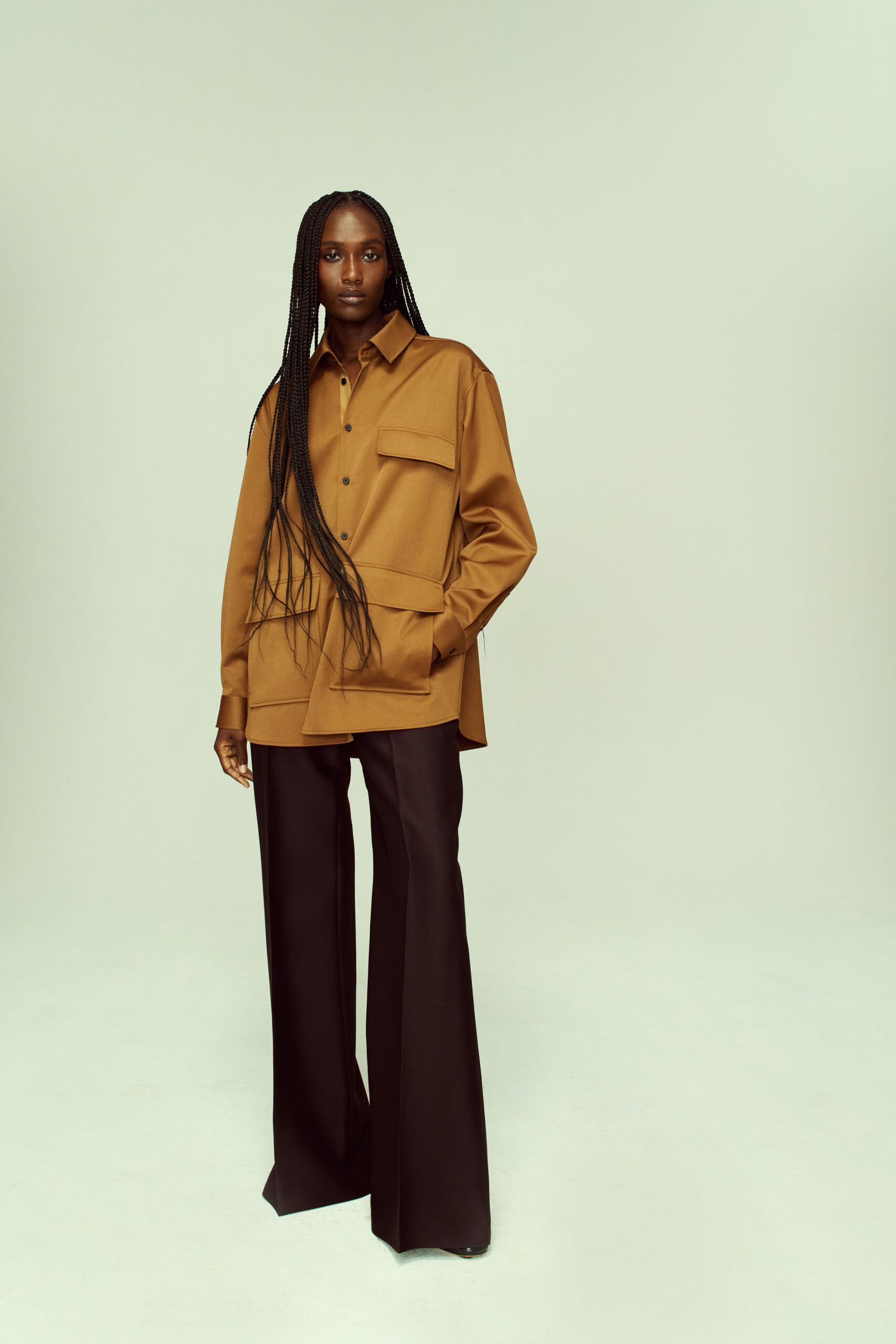 brown relaxed shirt with black pants