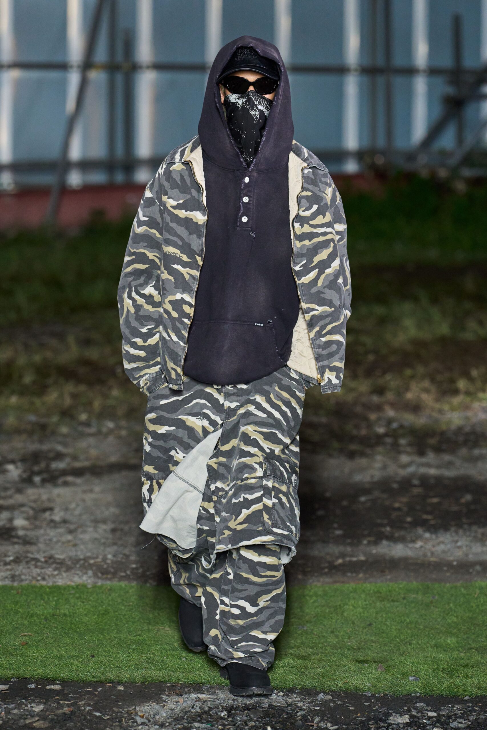 black hoodie with camouflage pants