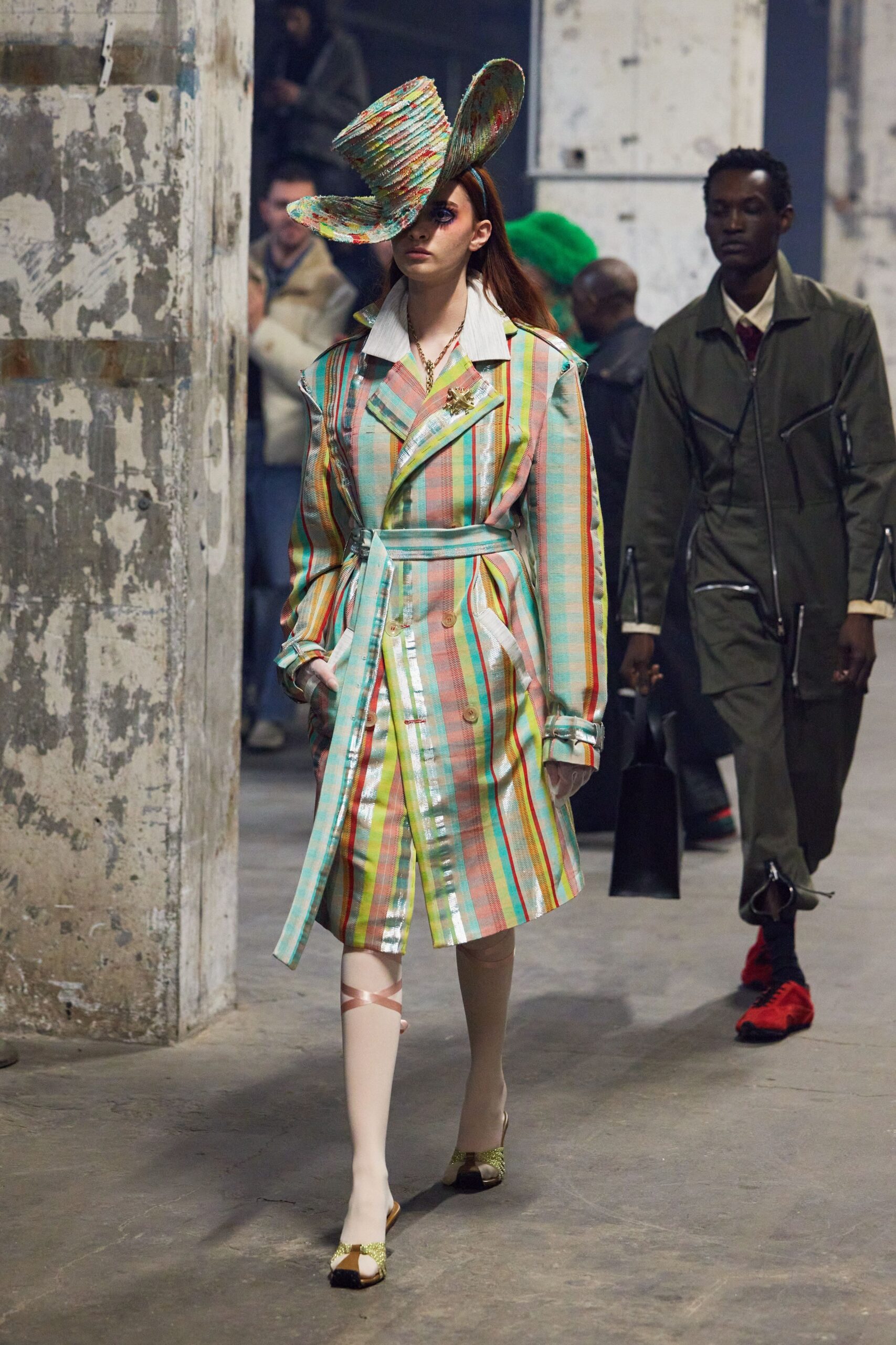 multi-colored vinyl coat with wide-brimmed hat